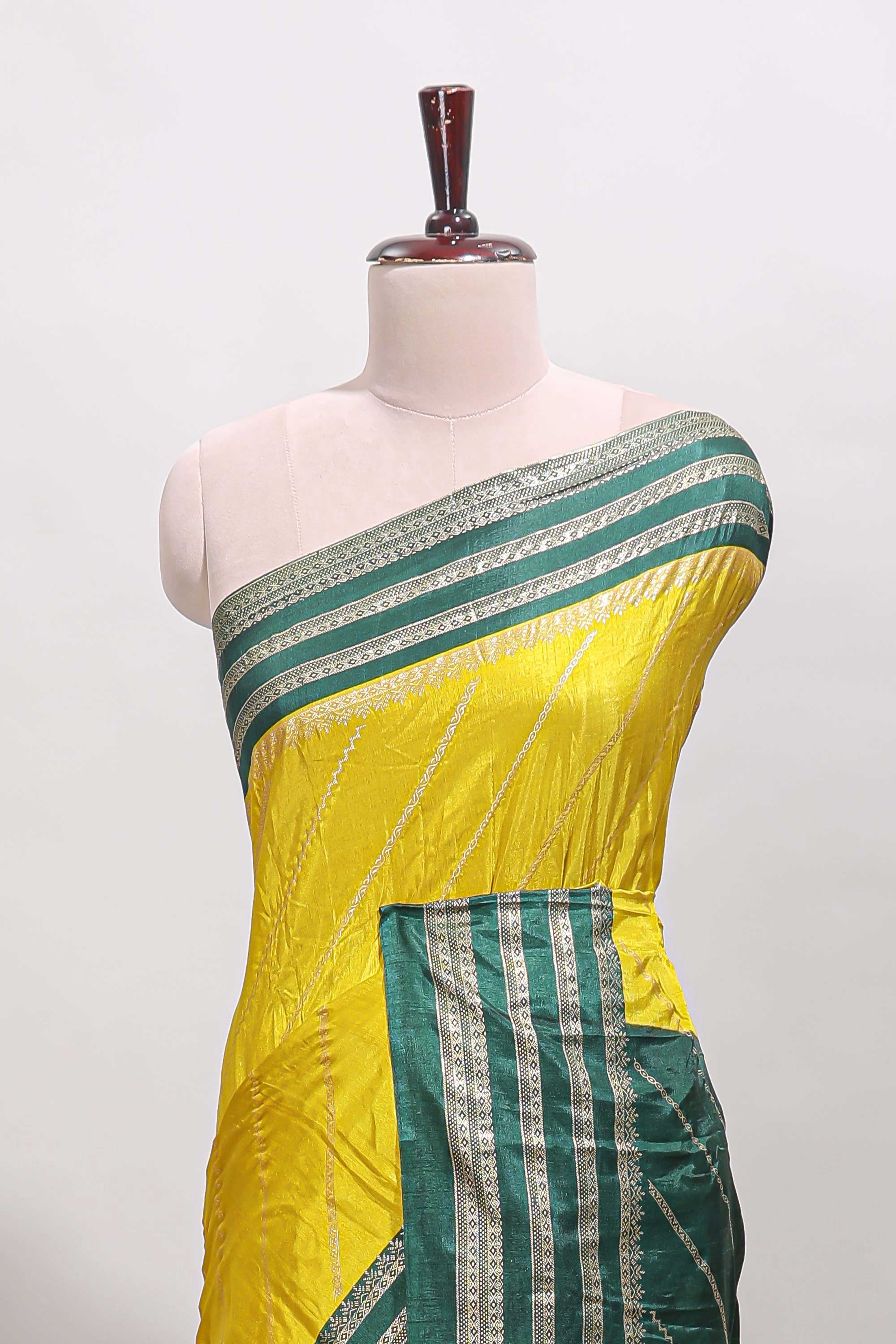 Yellow zari striped saree in dola silk with contrast woven border and blouse