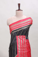 Black zari striped saree in dola silk with contrast woven border and blouse