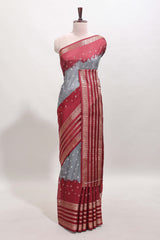 Grey unique buttas dola silk saree with contrast zari border and blouse