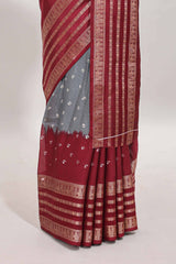 Grey unique buttas dola silk saree with contrast zari border and blouse