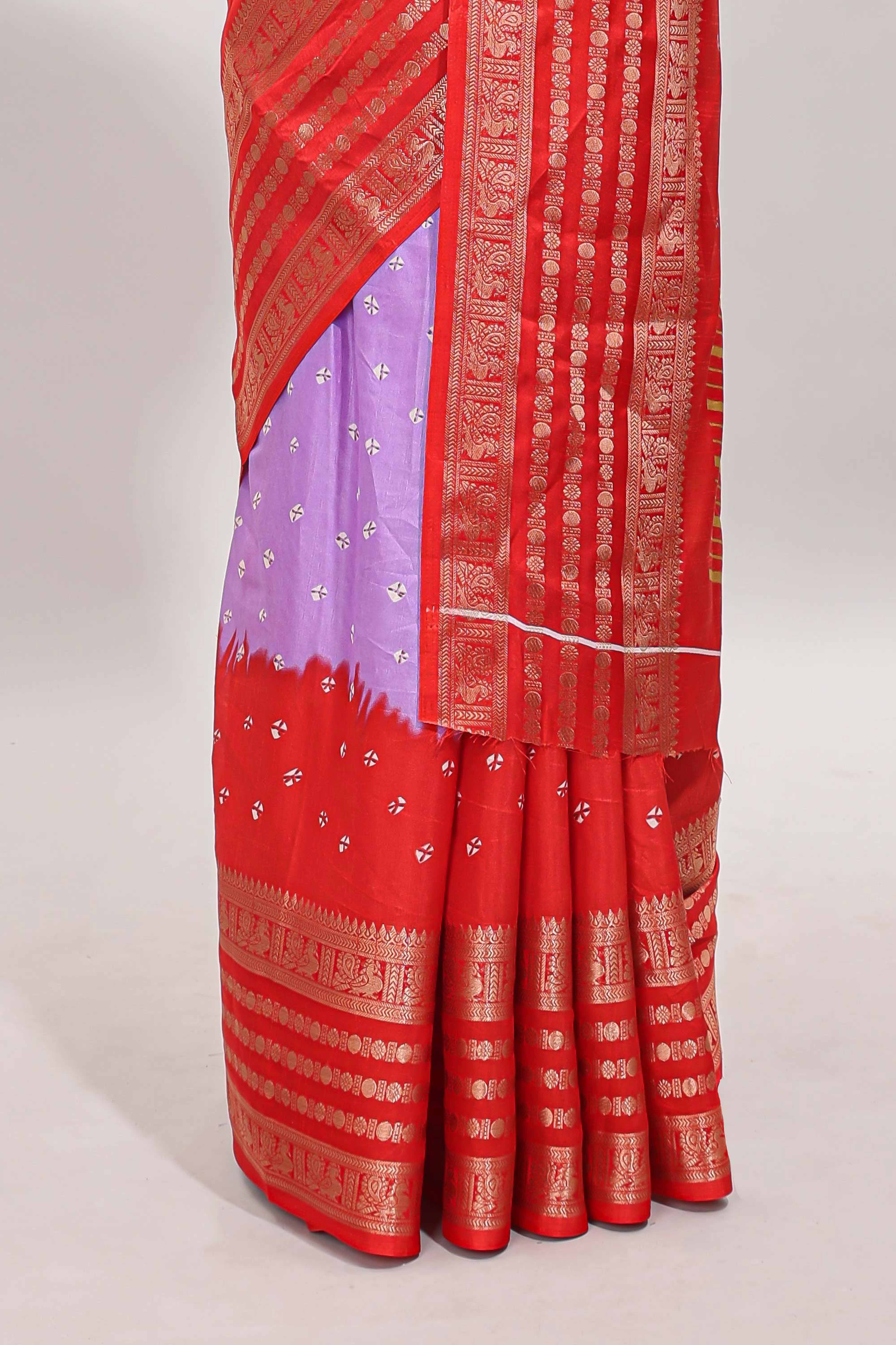 Lavender unique buttas dola silk saree with contrast zari border and blouse