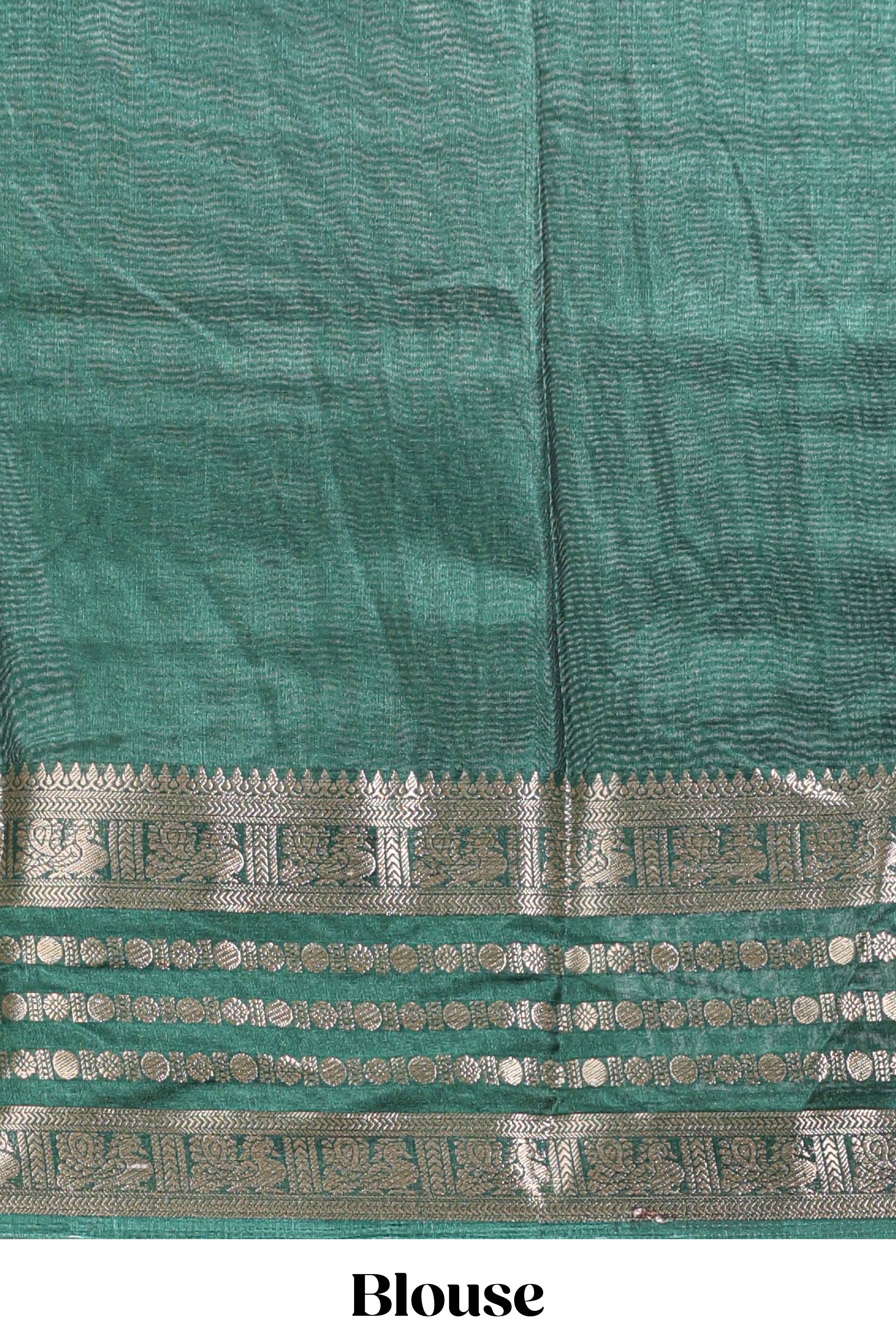 Green unique buttas dola silk saree with contrast dark green zari border and blouse