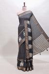 Black checked elephant motifs dola silk saree with self zari border and striped pallu