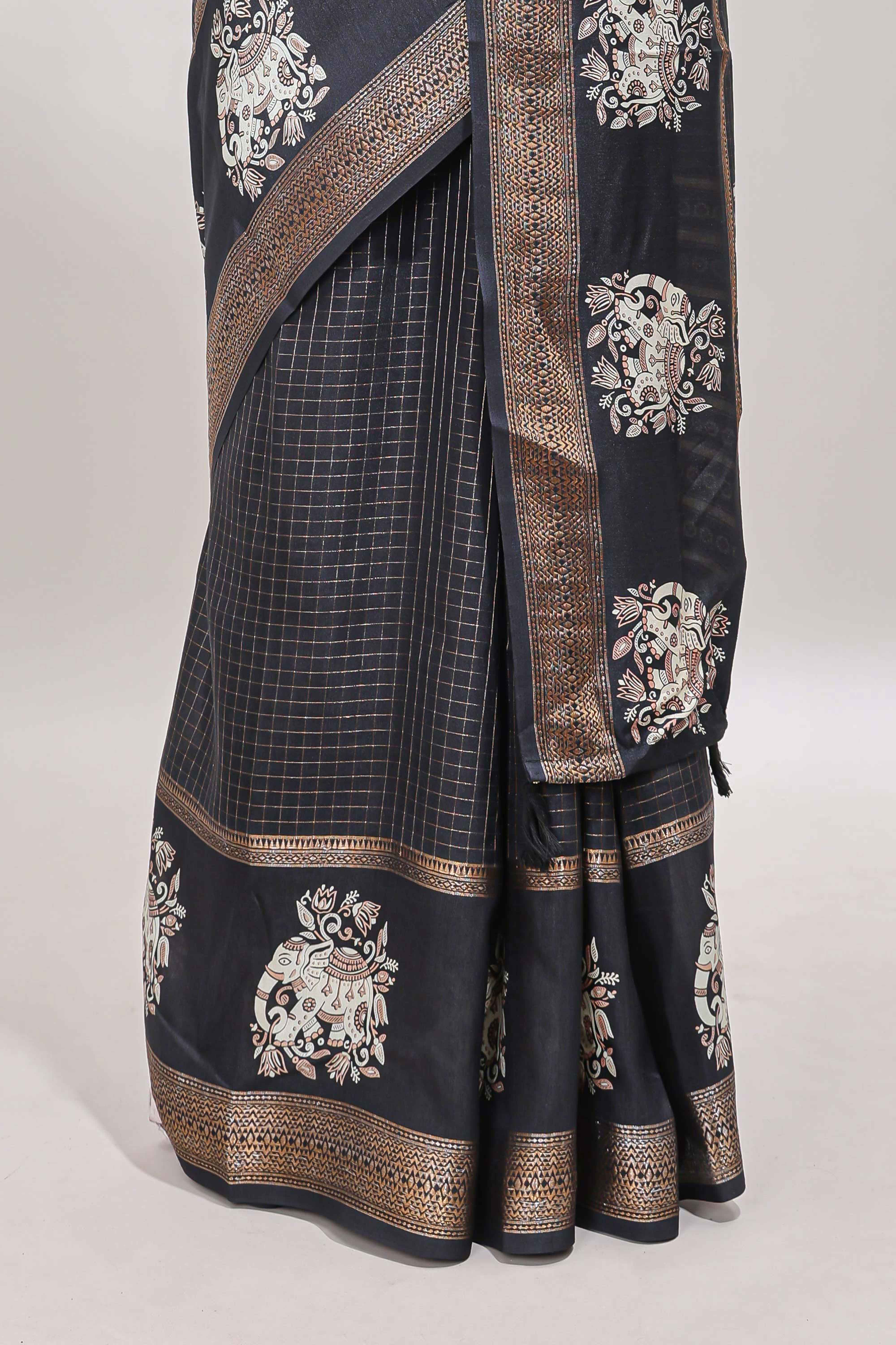 Black checked elephant motifs dola silk saree with self zari border and striped pallu