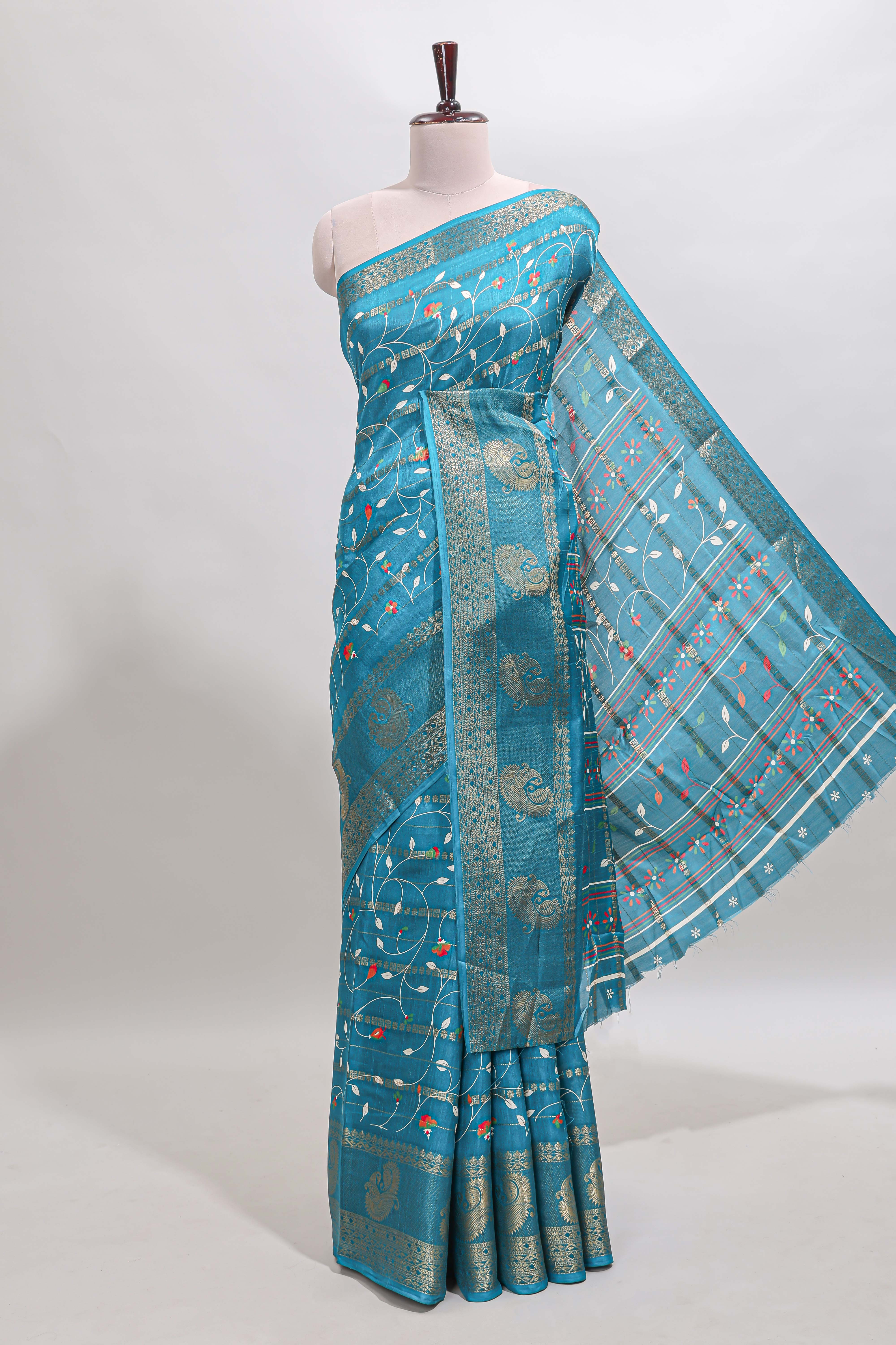 Midnight green zari striped floral vine design dola silk saree with self border and matching blouse