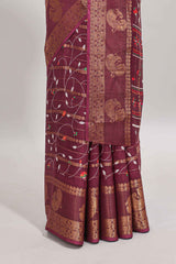 Maroon zari striped floral vine design dola silk saree with self border and matching blouse