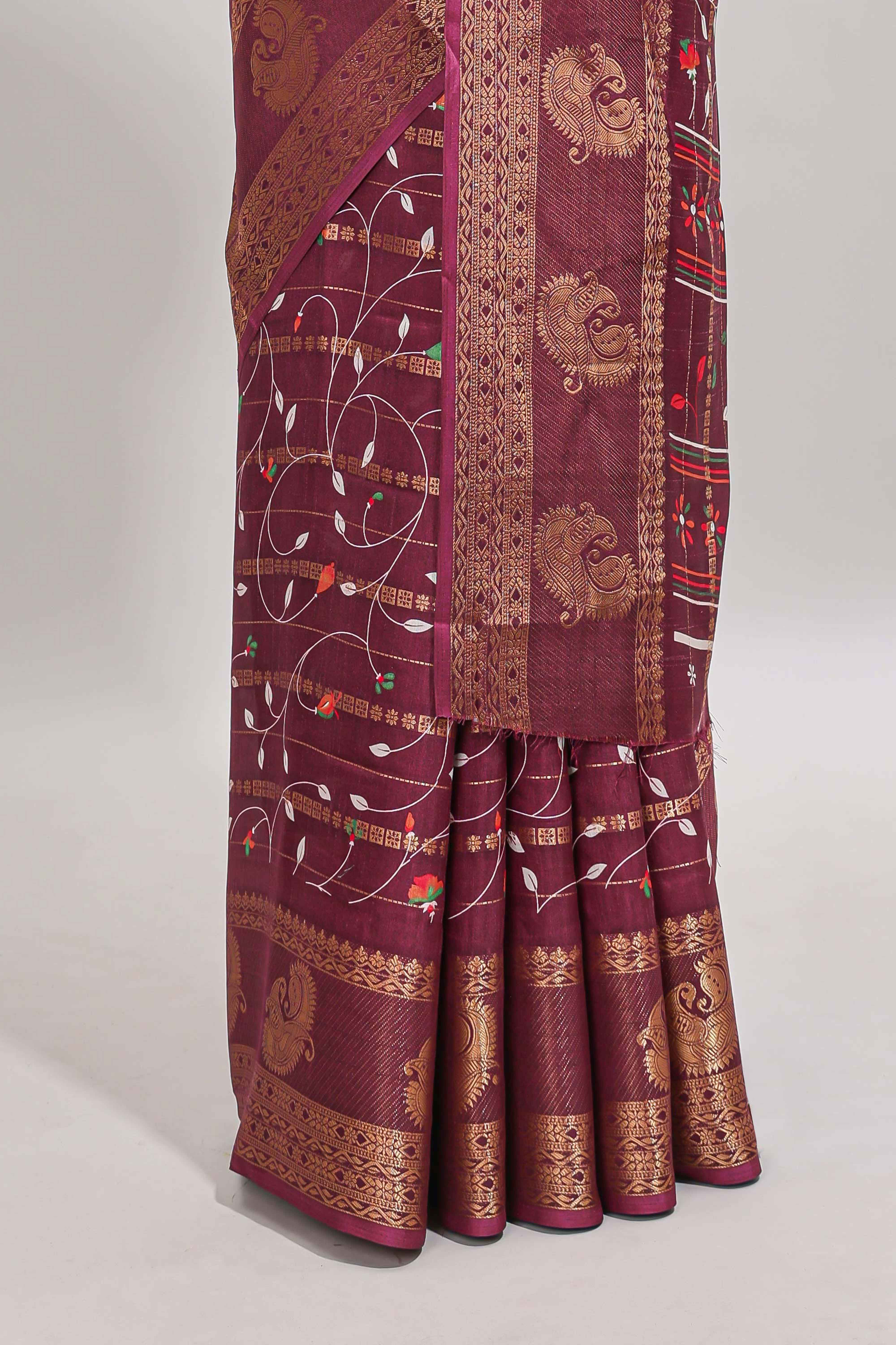 Maroon zari striped floral vine design dola silk saree with self border and matching blouse