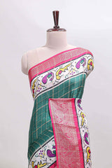 Green checked dola silk saree with contrast zari border and blouse