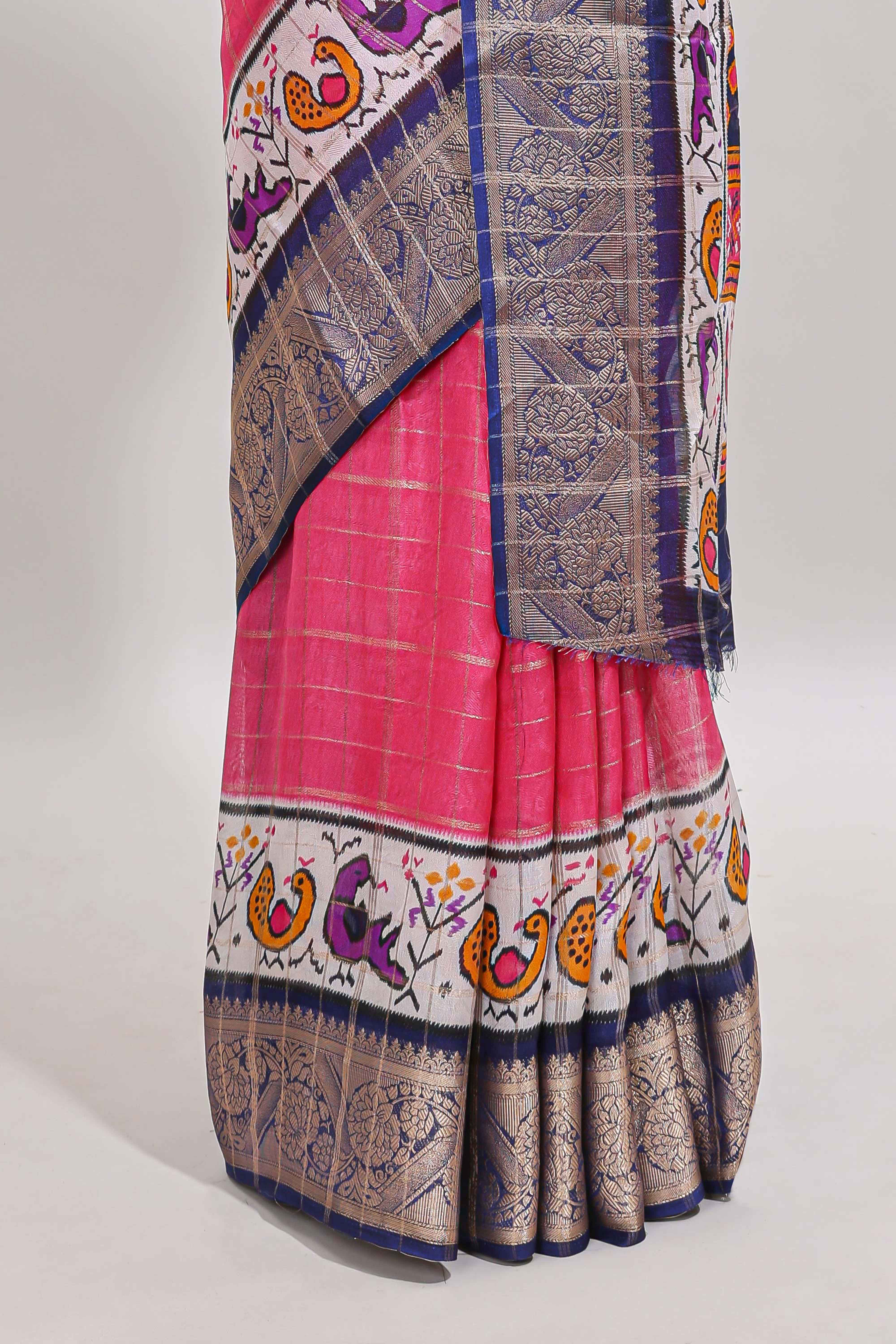 Pink checked dola silk saree with contrast zari border and blouse