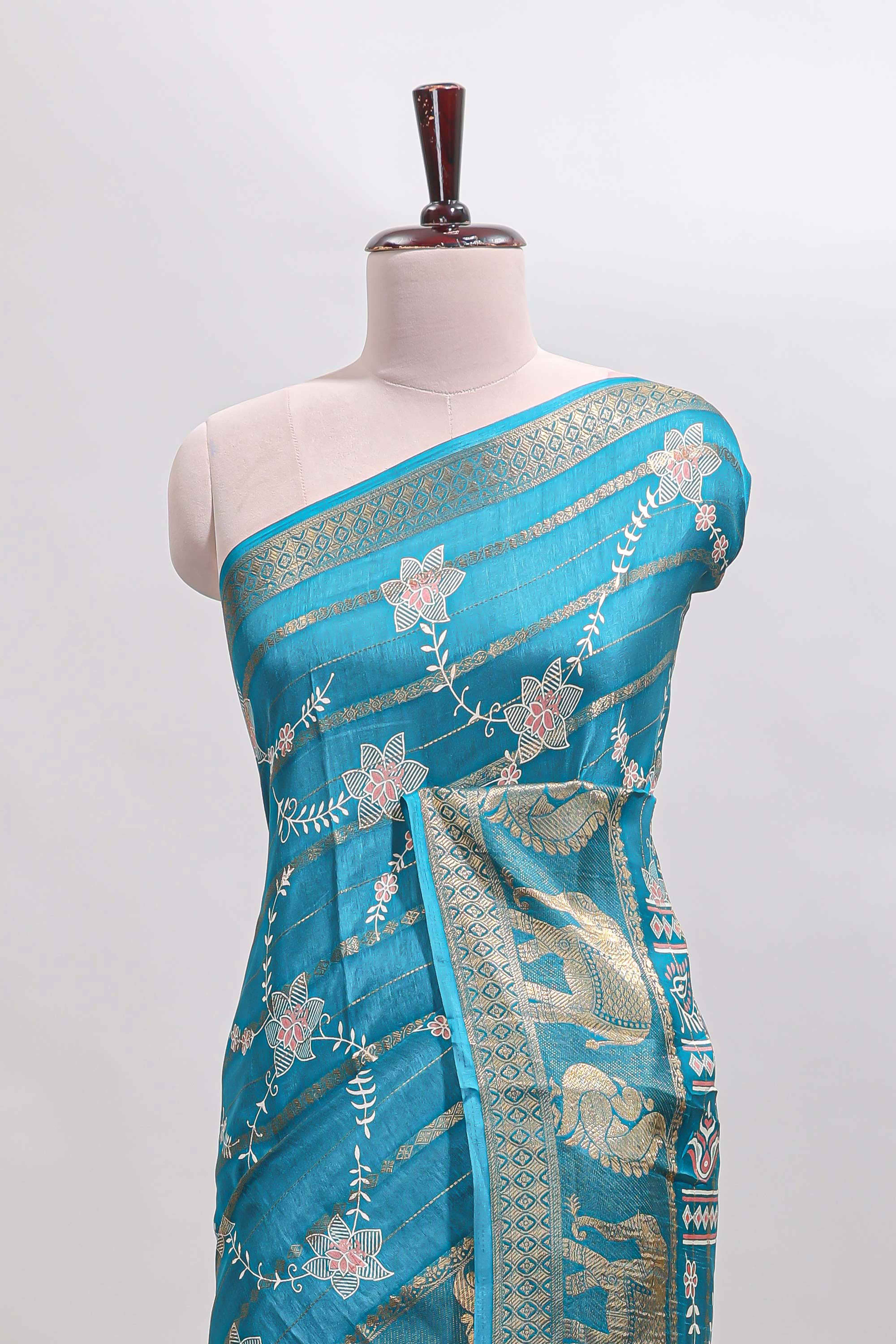 Midnight green striped floral vine dola silk saree with self zari border and matching blouse