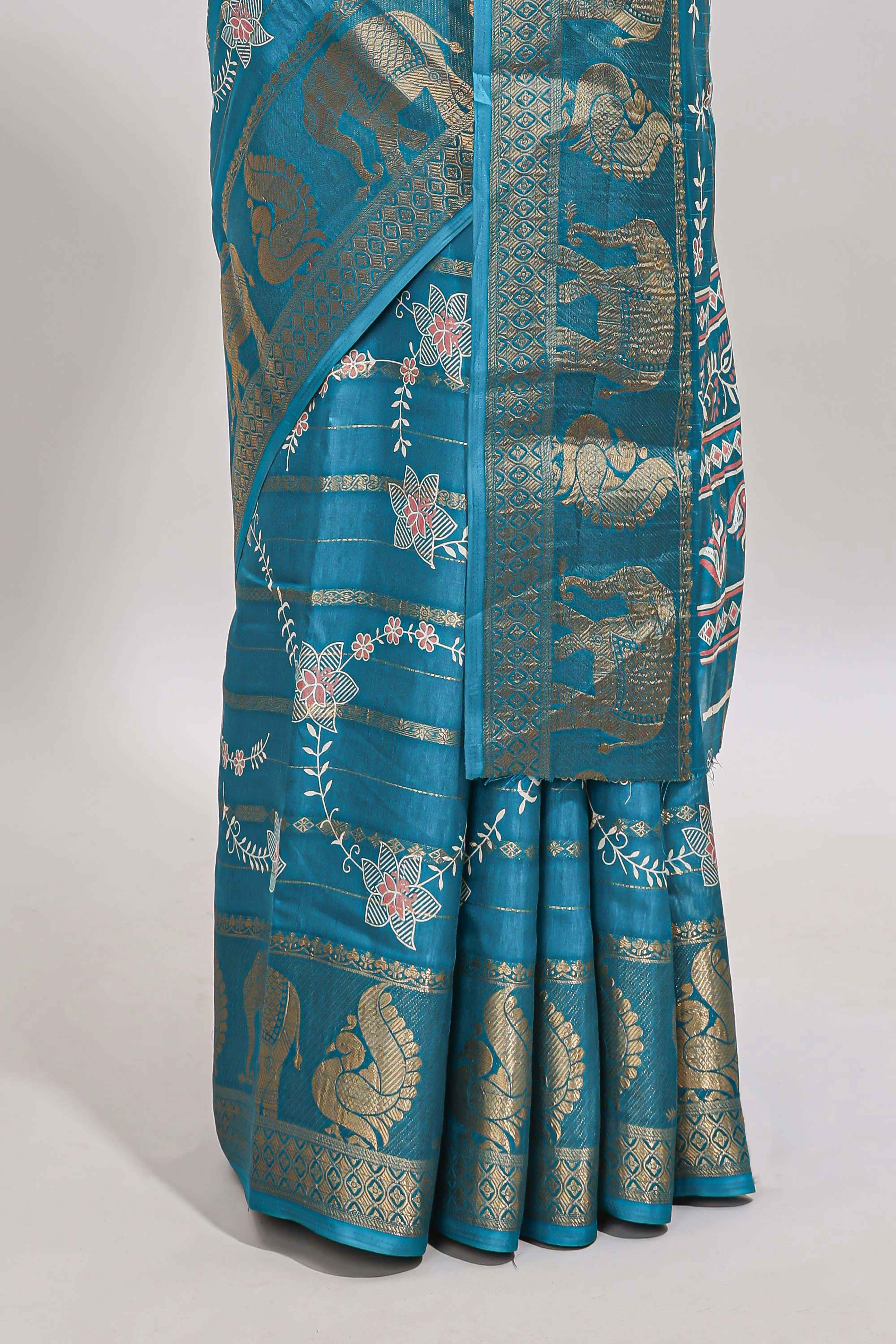 Midnight green striped floral vine dola silk saree with self zari border and matching blouse