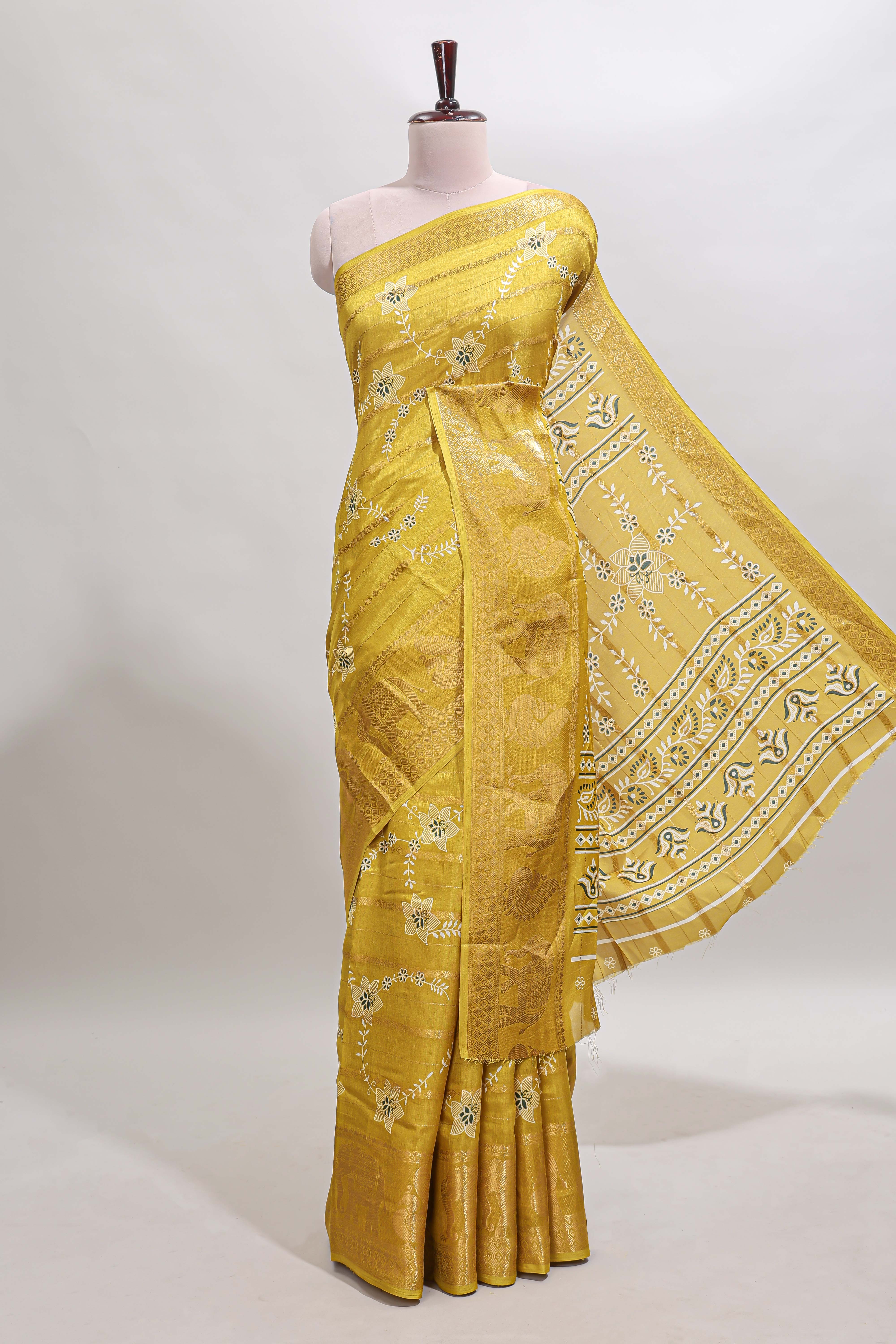 Yellow striped floral vine dola silk saree with self zari border and matching blouse