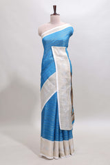 Blue zari striped dola silk saree withcontrast zari border and printed blouse
