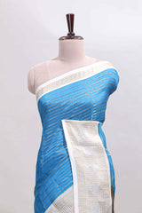 Blue zari striped dola silk saree withcontrast zari border and printed blouse