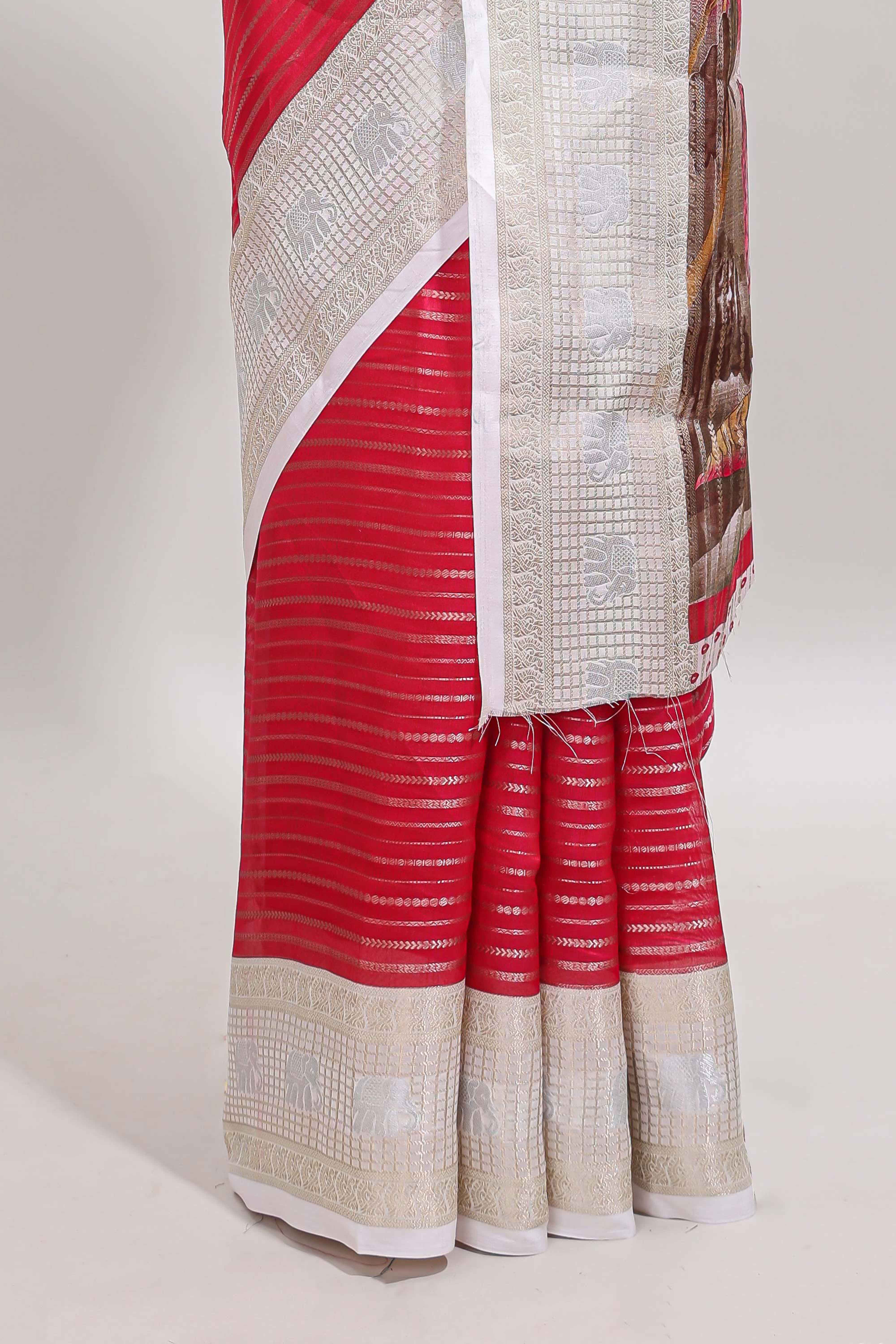 Pink zari striped dola silk saree withcontrast zari border and printed blouse