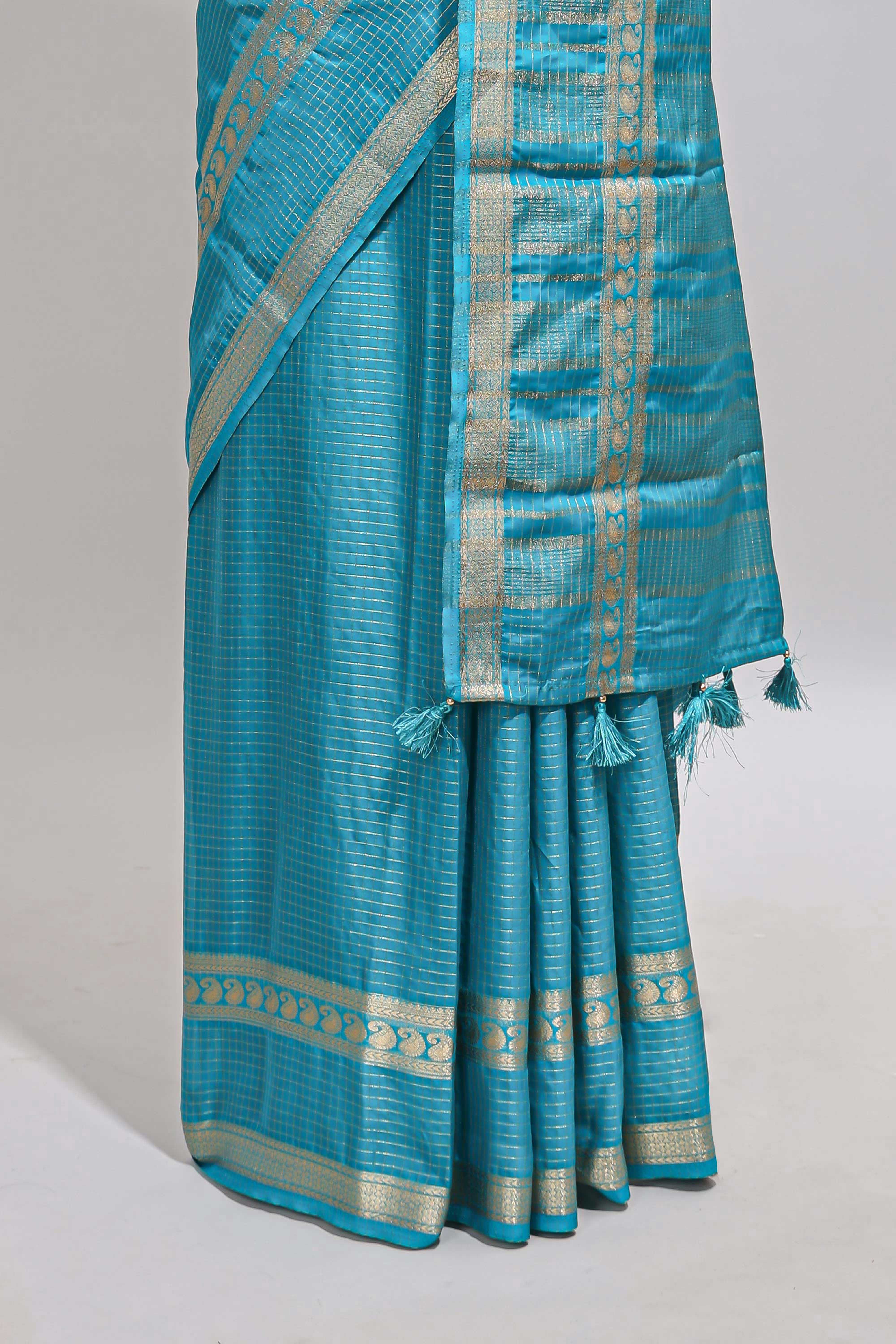 Blue checked dola silk saree with self zari border and matching striped pallu