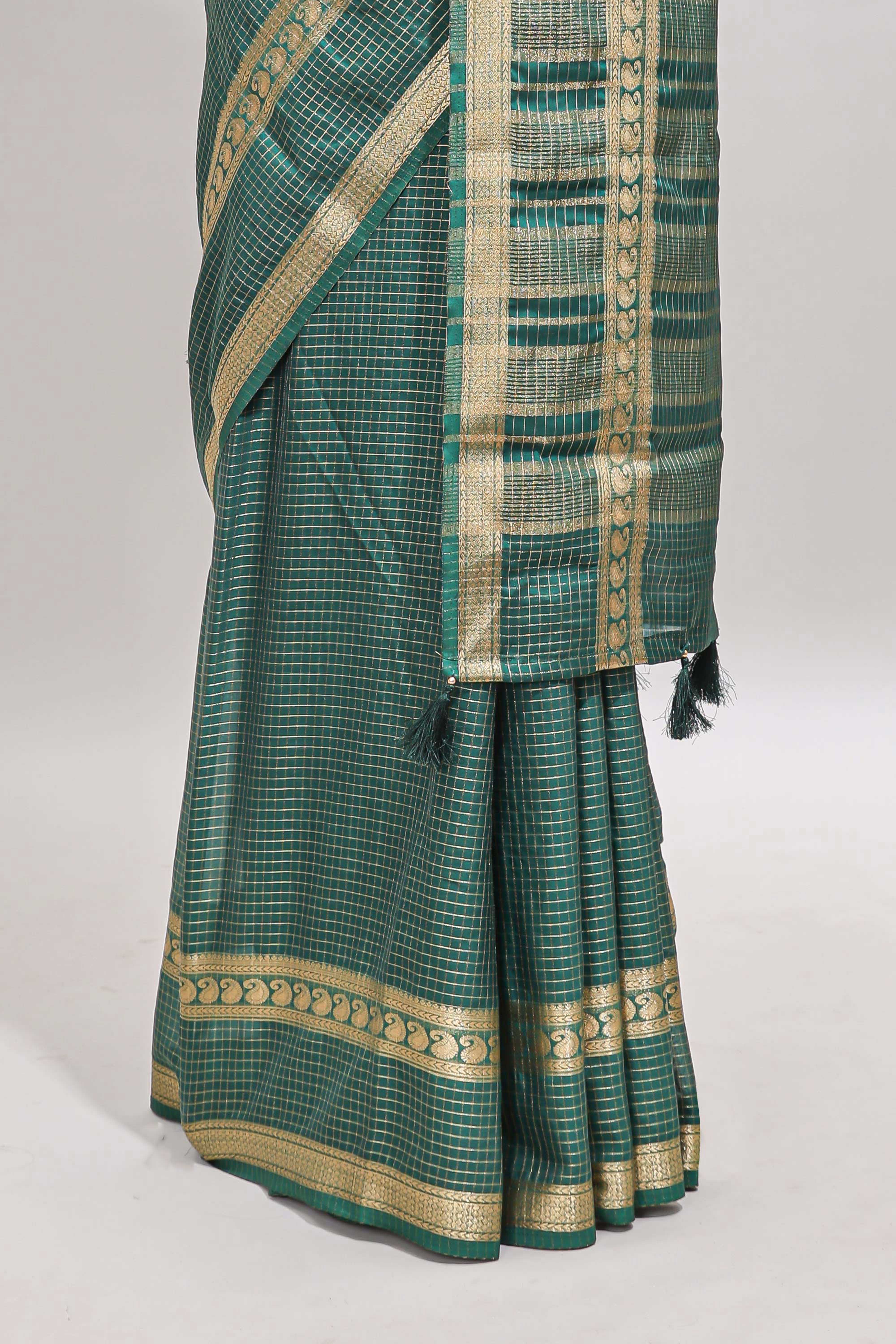 Green checked dola silk saree with self zari border and matching striped pallu