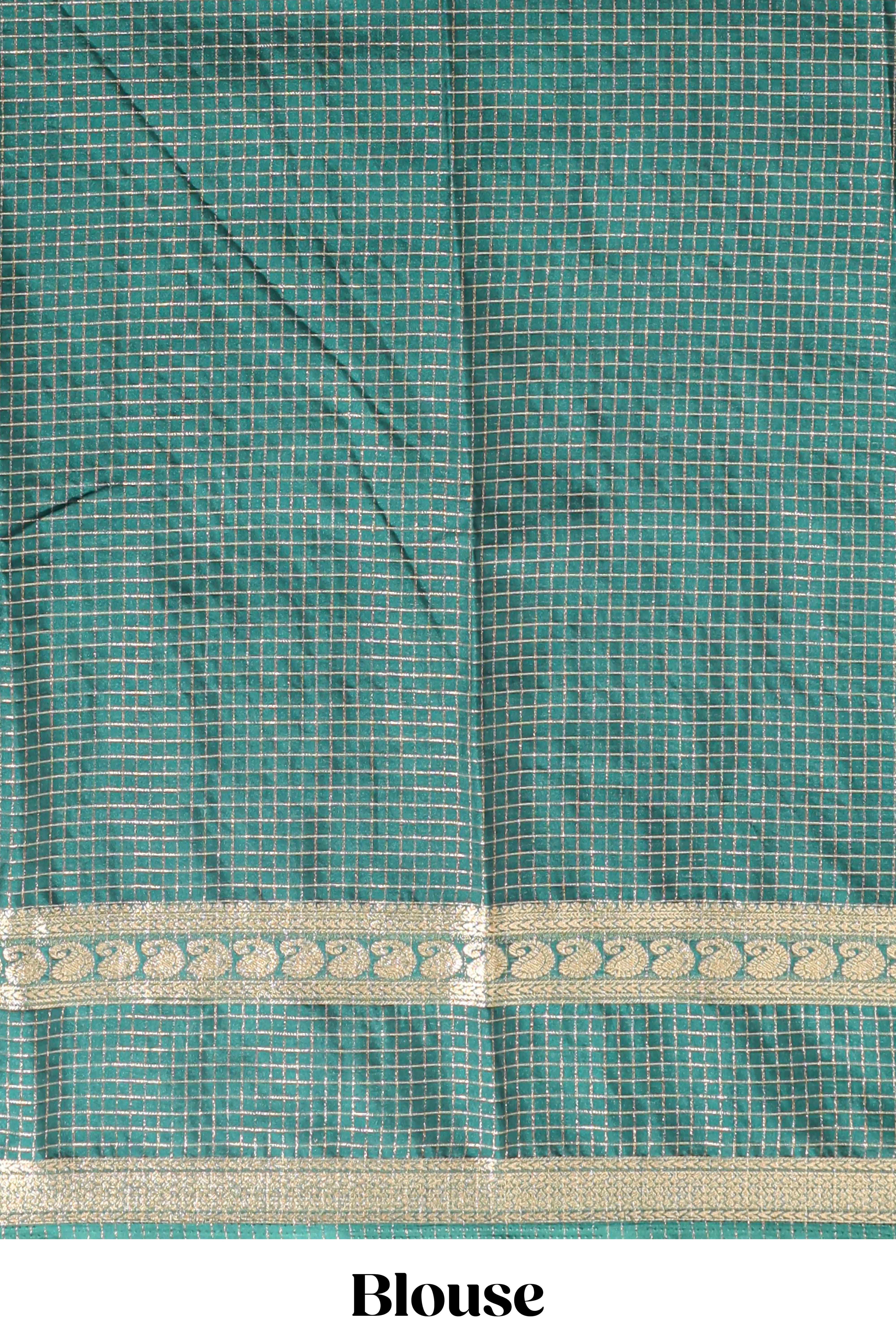 Green checked dola silk saree with self zari border and matching striped pallu
