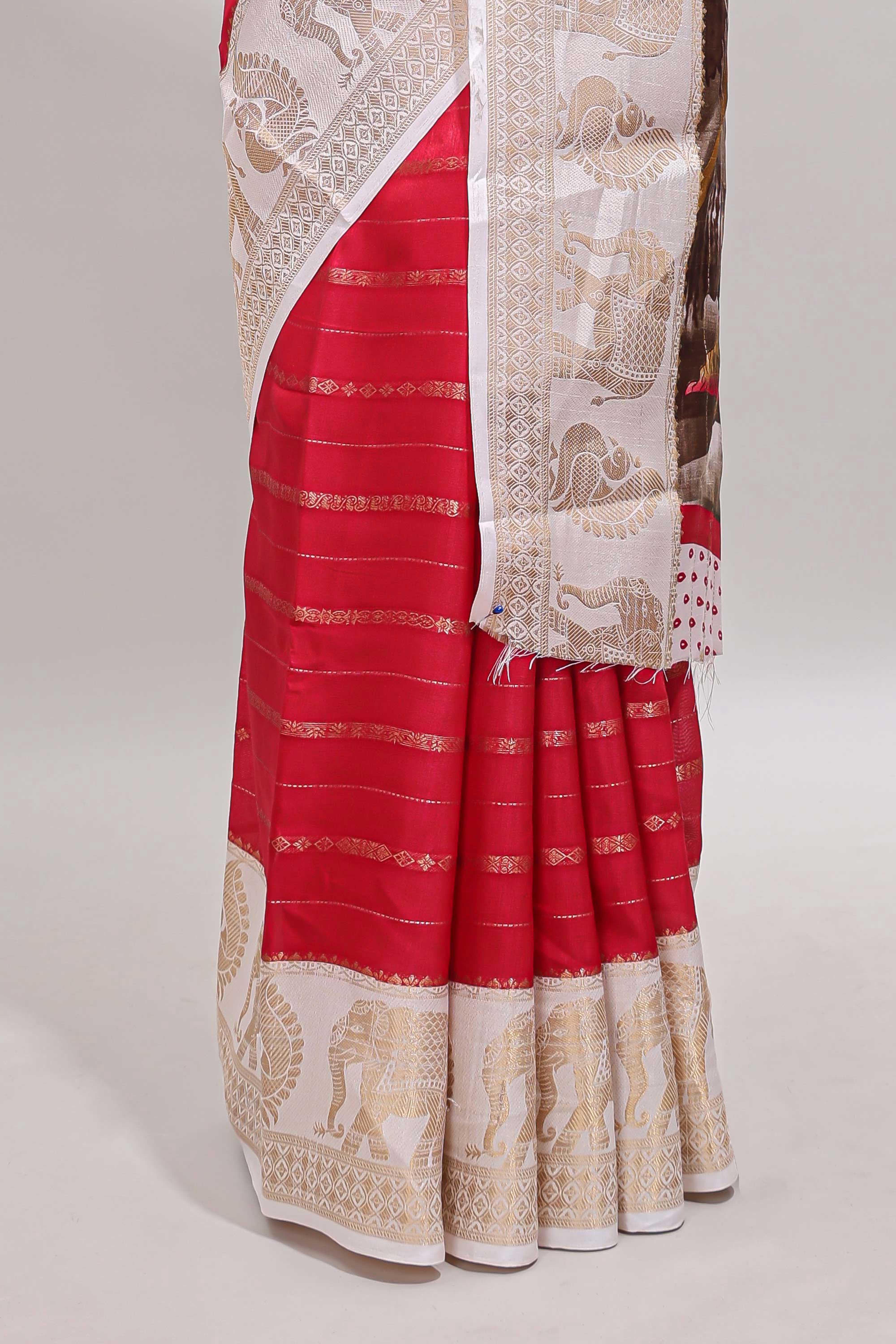 Pink striped dola silk saree with contrast zari border and kalamkari style pallu