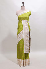Green striped dola silk saree with contrast zari border and kalamkari style pallu