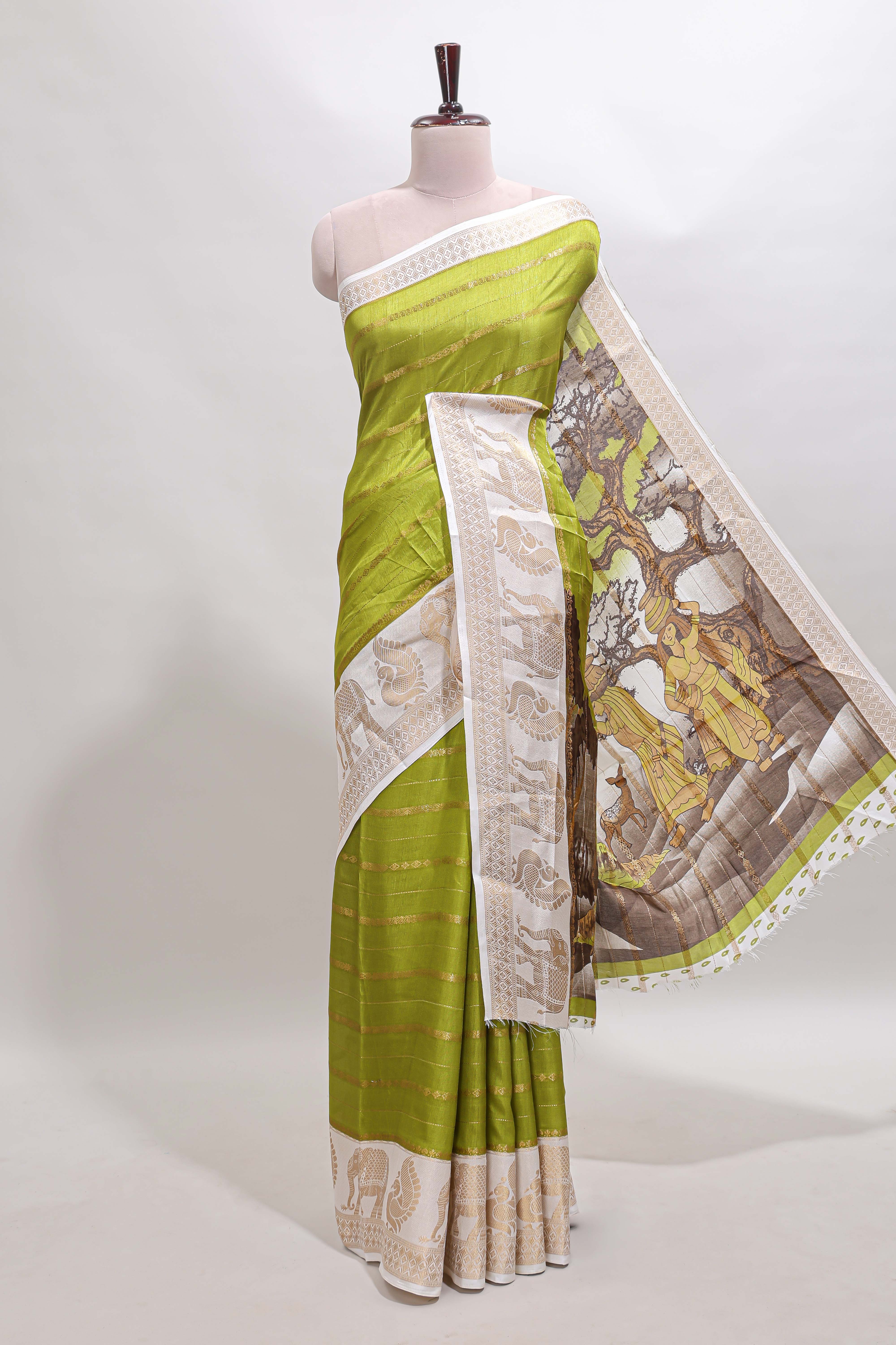 Green striped dola silk saree with contrast zari border and kalamkari style pallu