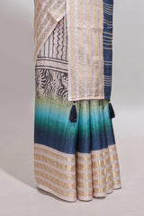 Blue geometric design dola silk saree with contrast zari border and matching blouse