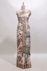 Brown floral design dola silk saree with sellf zari border and matching blouse