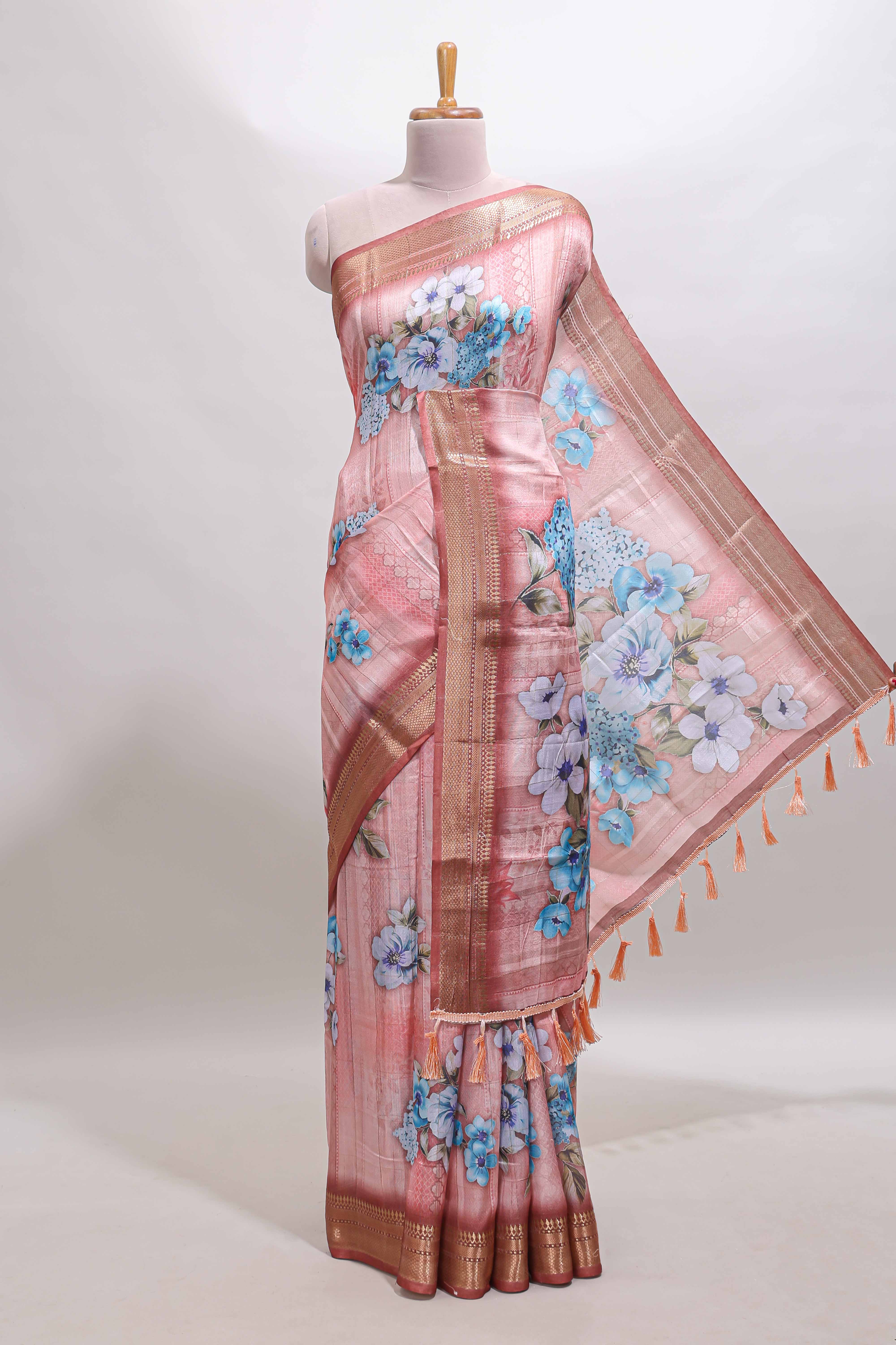 Peach floral design dola silk saree with sellf zari border and matching blouse