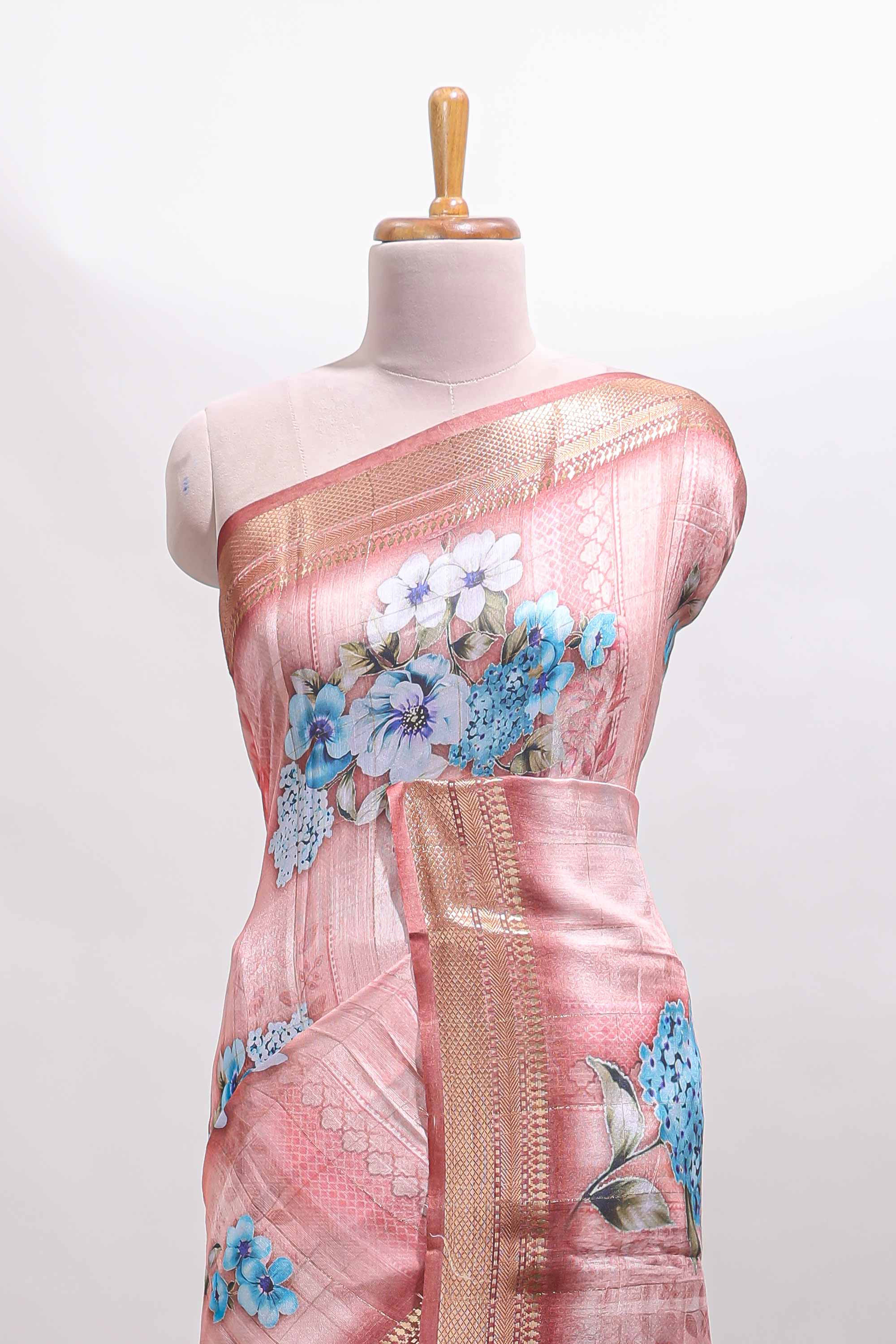 Peach floral design dola silk saree with sellf zari border and matching blouse