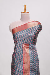 Steal blue dola silk saree with contrast coper gold zari border and contrast blouse