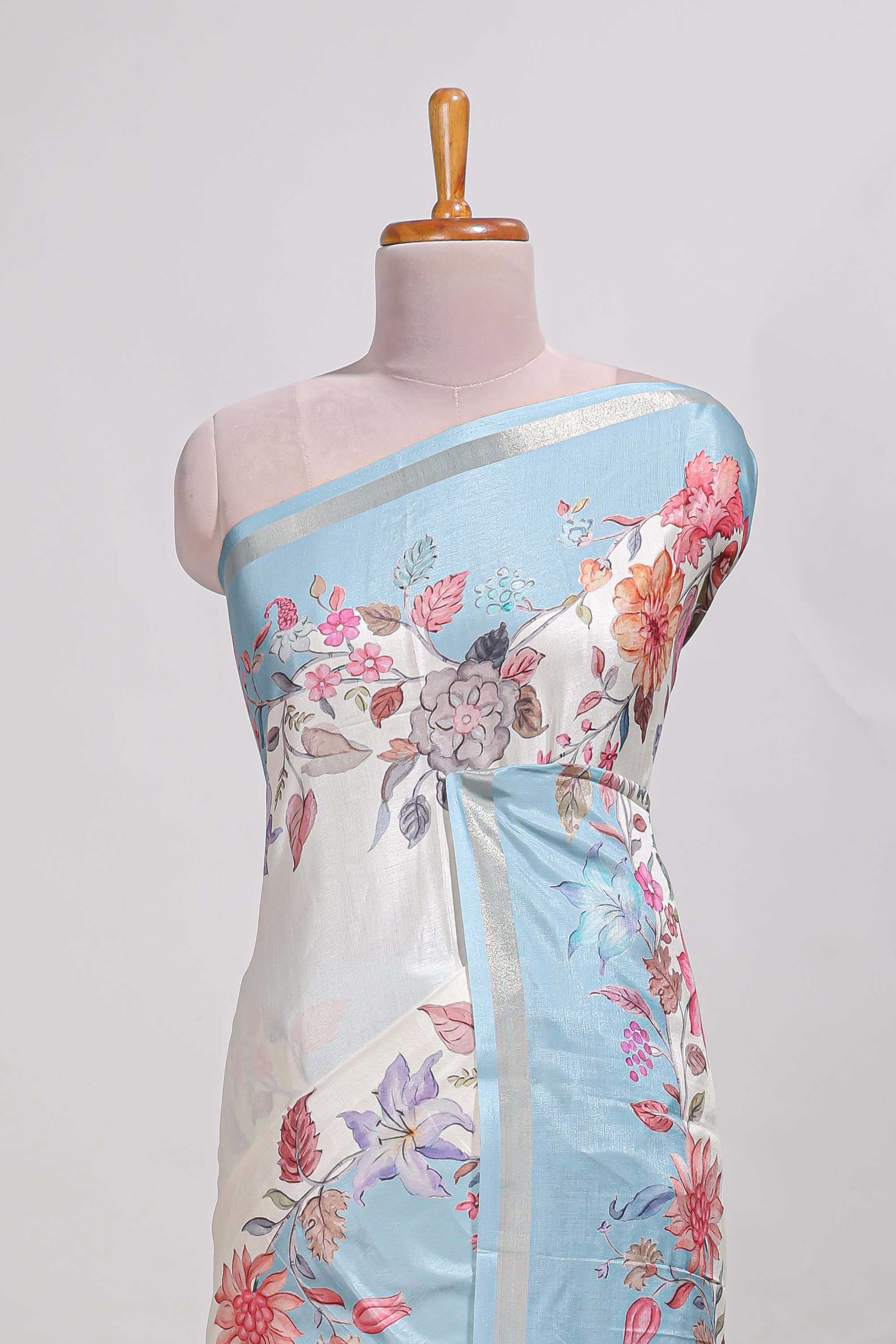 Plaindola silk saree with floral printed border and plain contrast blouse