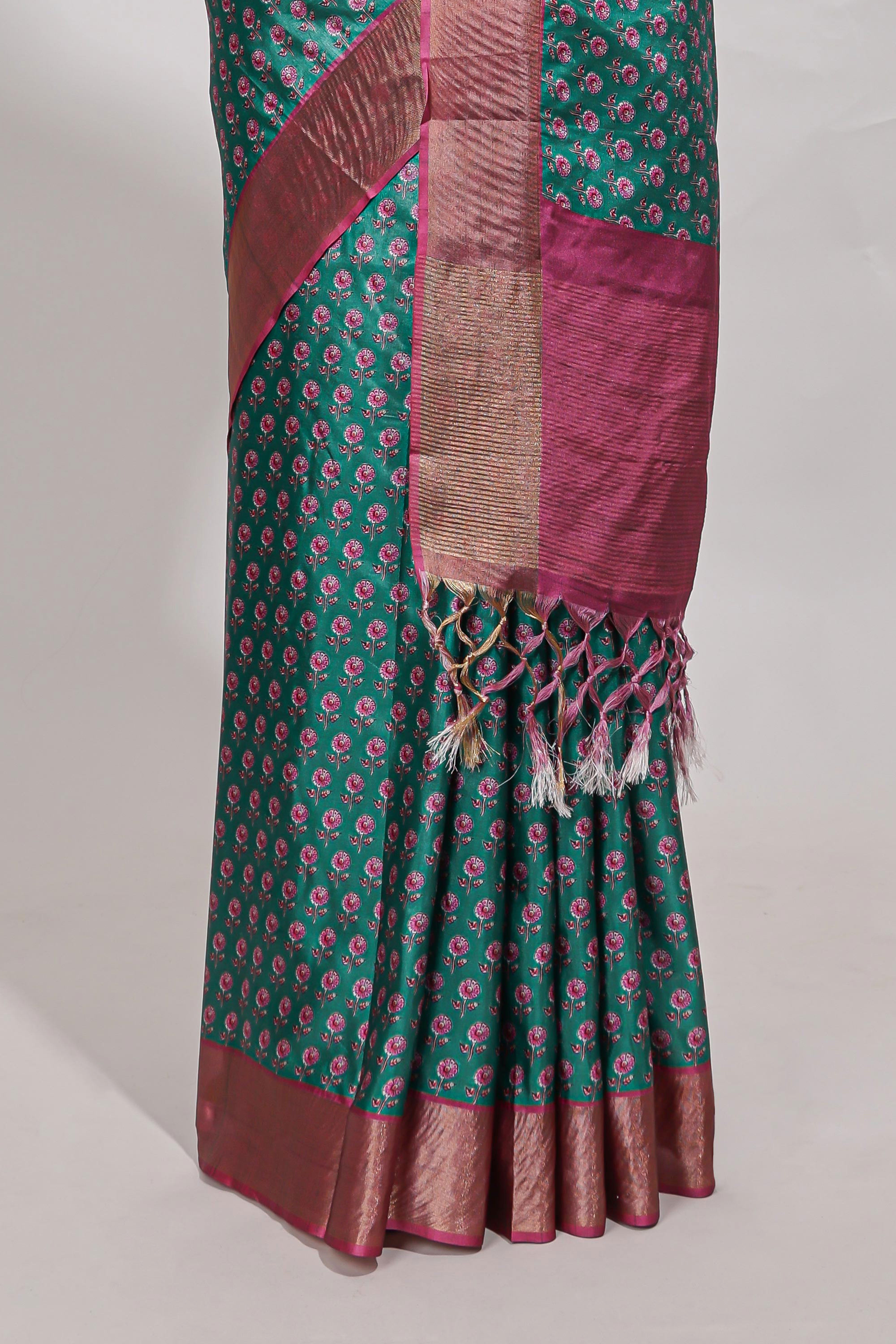 Bottle green dola silk saree with contrast coper gold zari border and contrast blouse