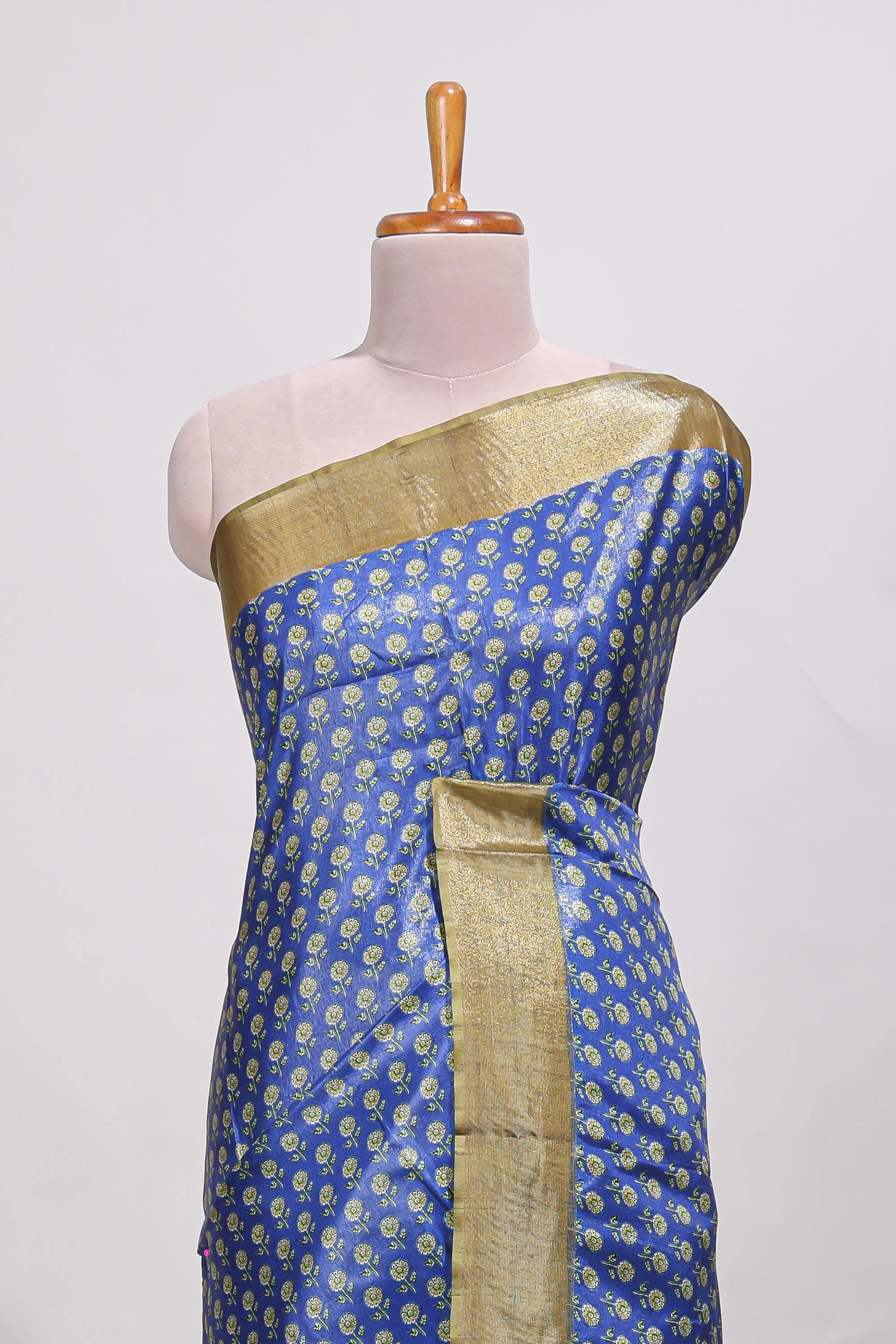 Blue dola silk saree with contrast coper gold zari border and contrast blouse