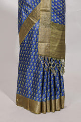 Blue dola silk saree with contrast coper gold zari border and contrast blouse