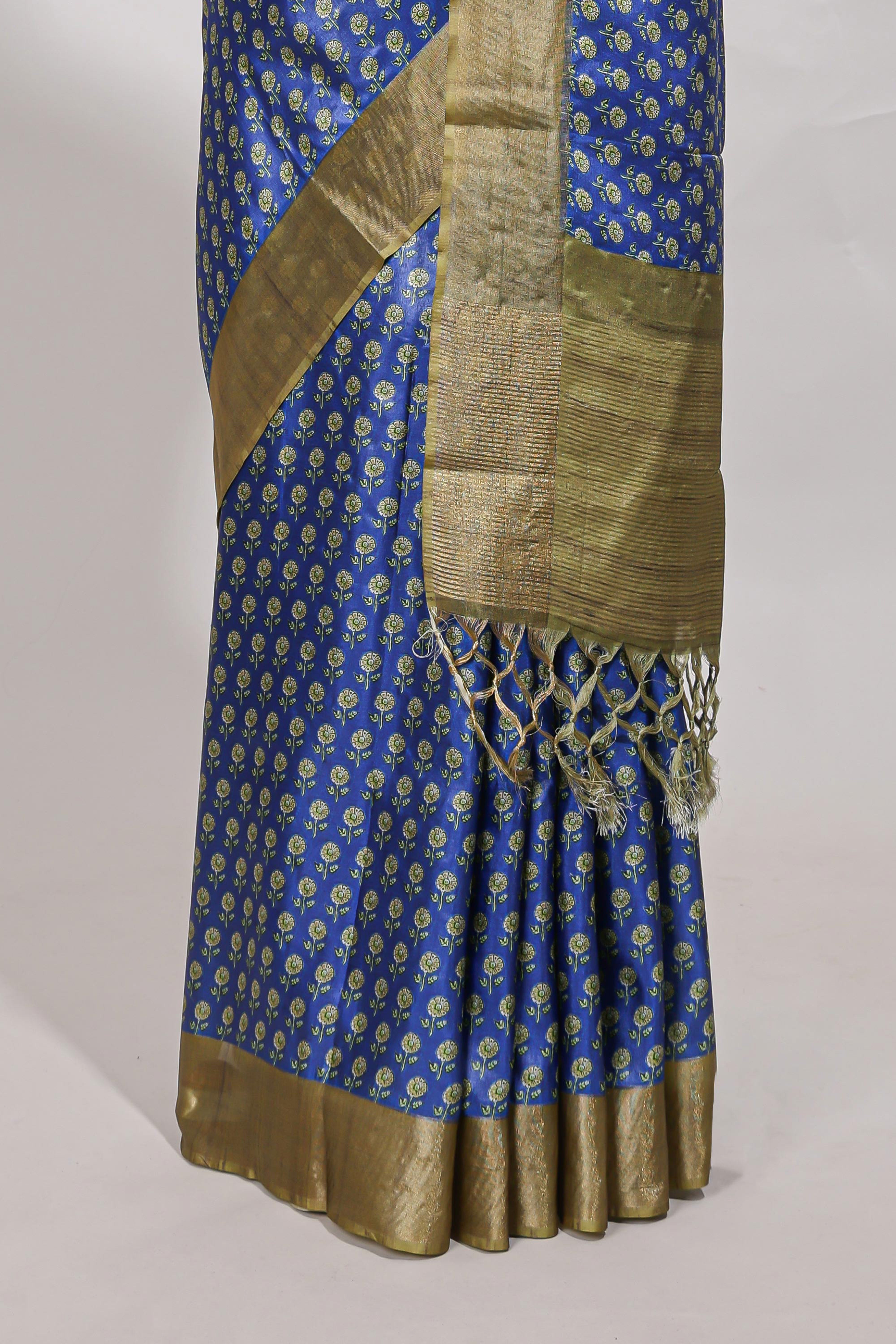 Blue dola silk saree with contrast coper gold zari border and contrast blouse