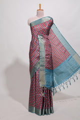 Maroon dola silk saree with contrast coper gold zari border and contrast blouse