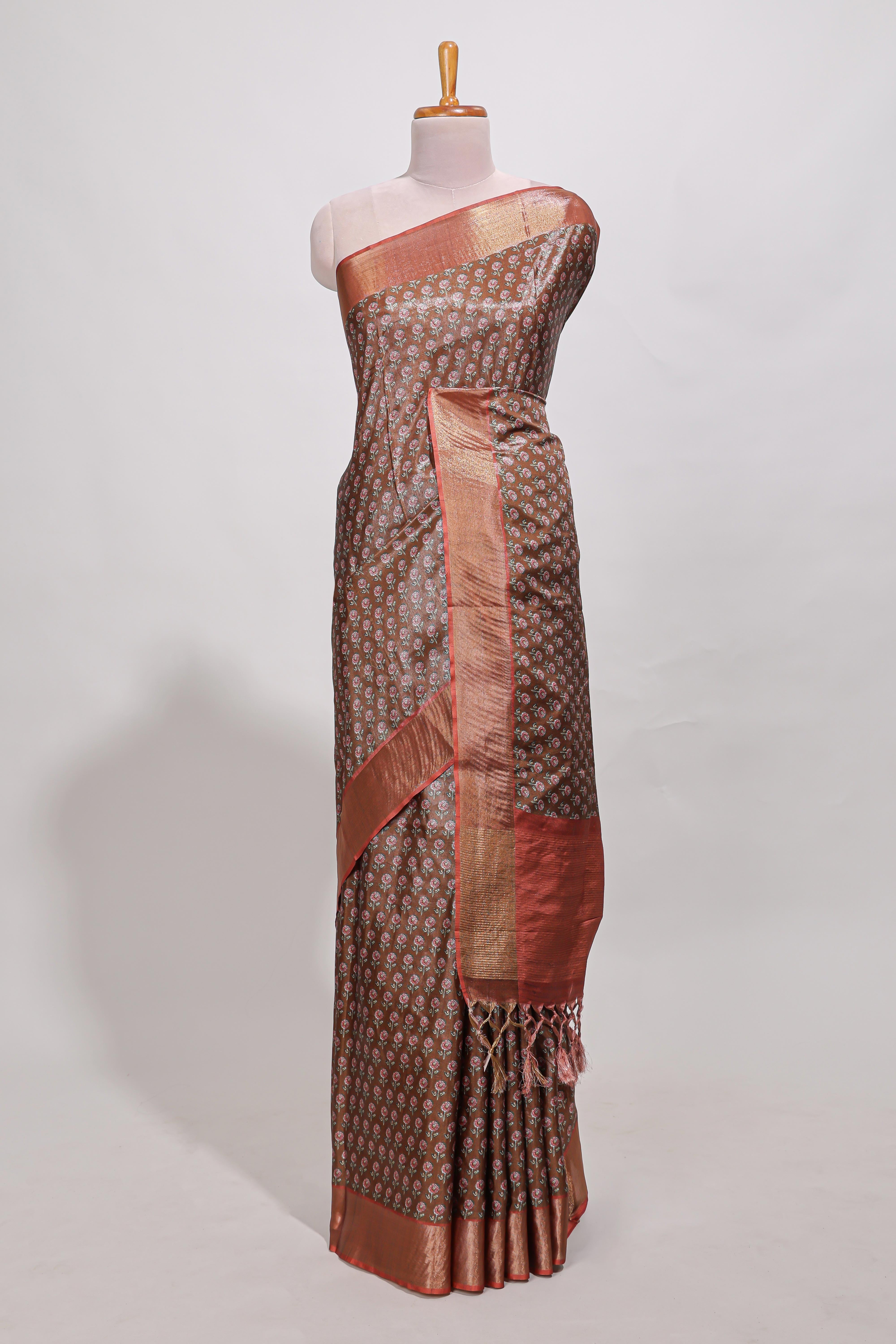 Brown dola silk saree with contrast coper gold zari border and contrast blouse