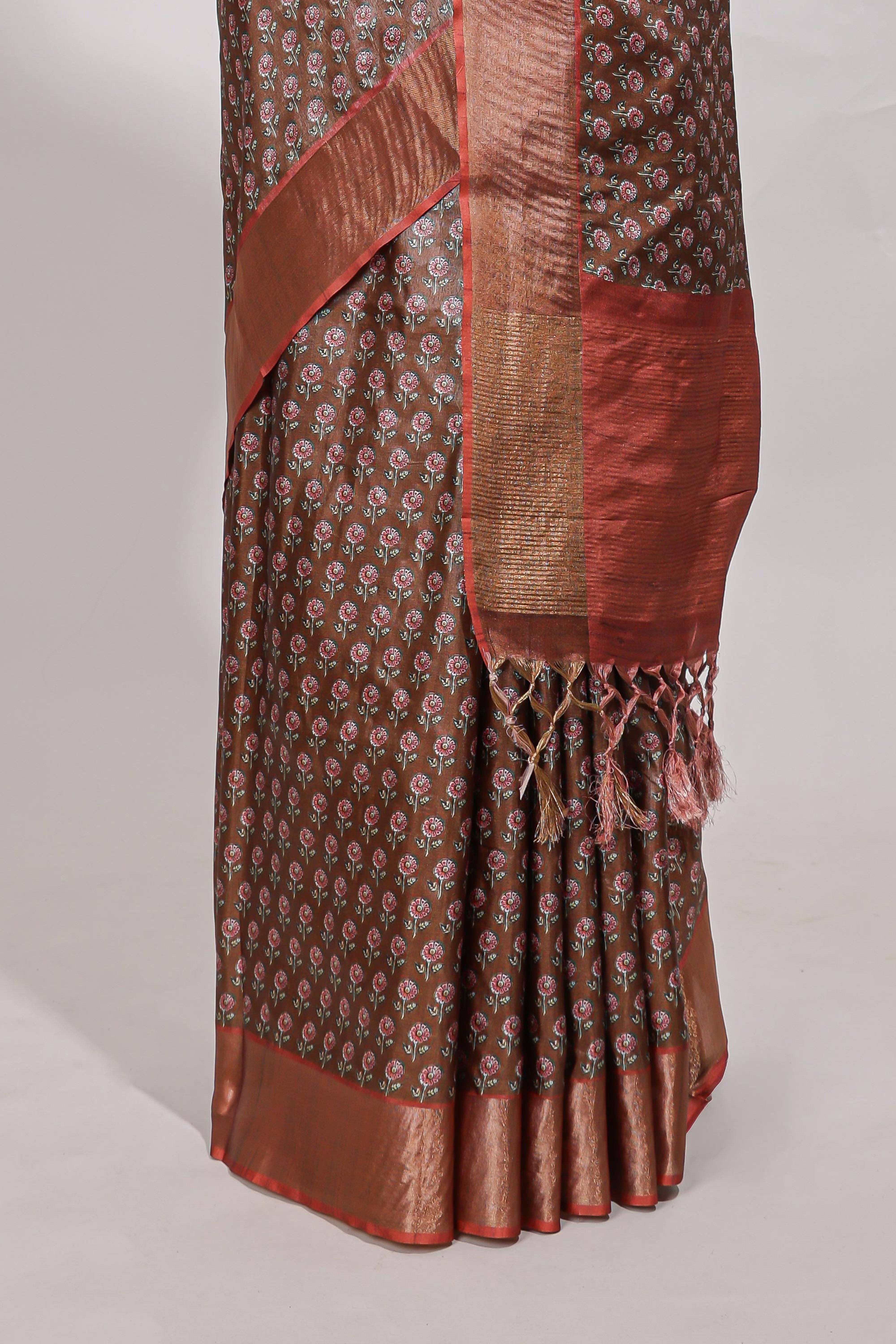 Brown dola silk saree with contrast coper gold zari border and contrast blouse
