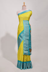 Yellow Dola silk saree all overzari workdesign with contrast zig zag border and contrast kalmkari printed pallu