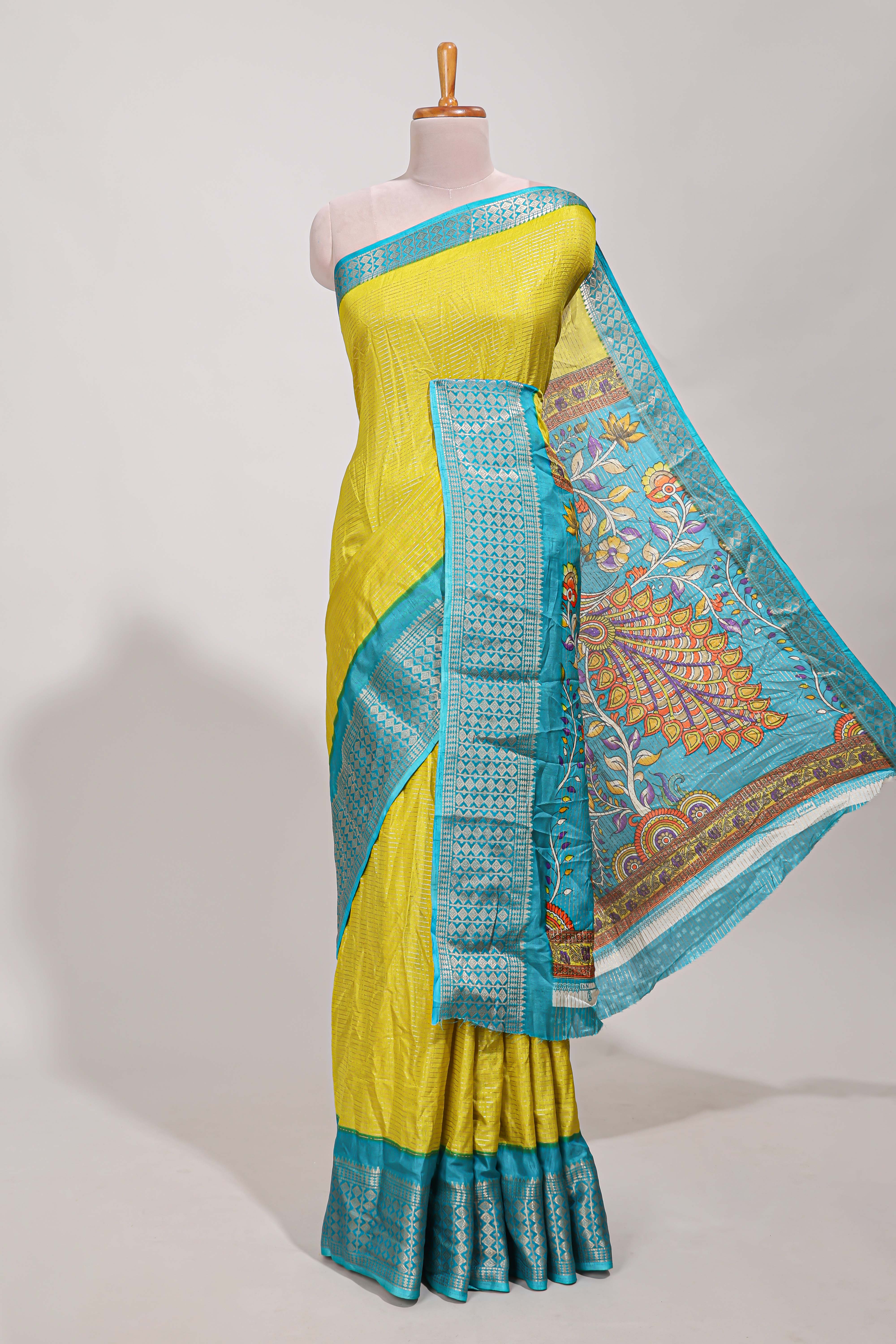 Yellow Dola silk saree all overzari workdesign with contrast zig zag border and contrast kalmkari printed pallu