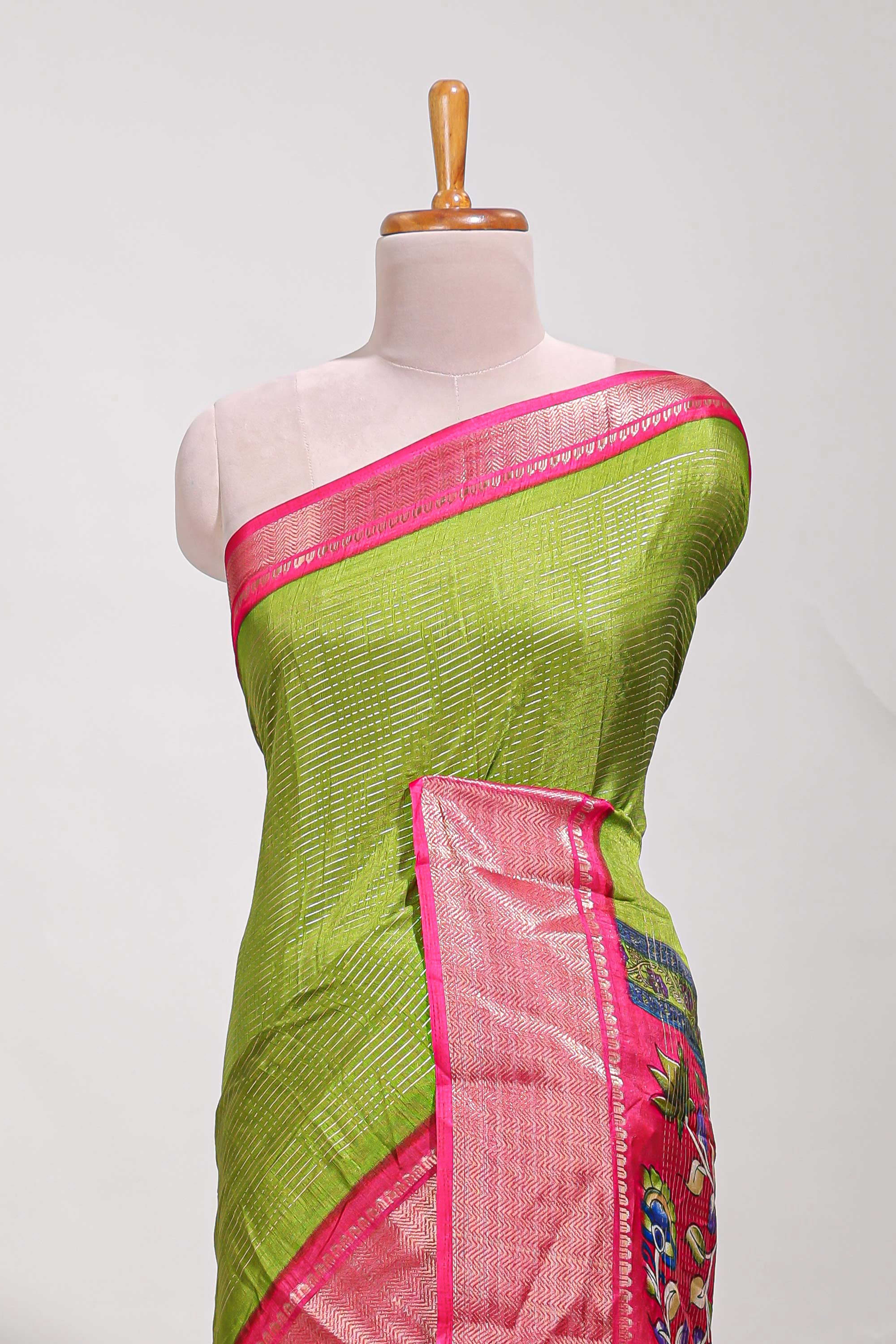 Green Dola silk saree all overzari workdesign with contrast zig zag border and contrast kalmkari printed pallu