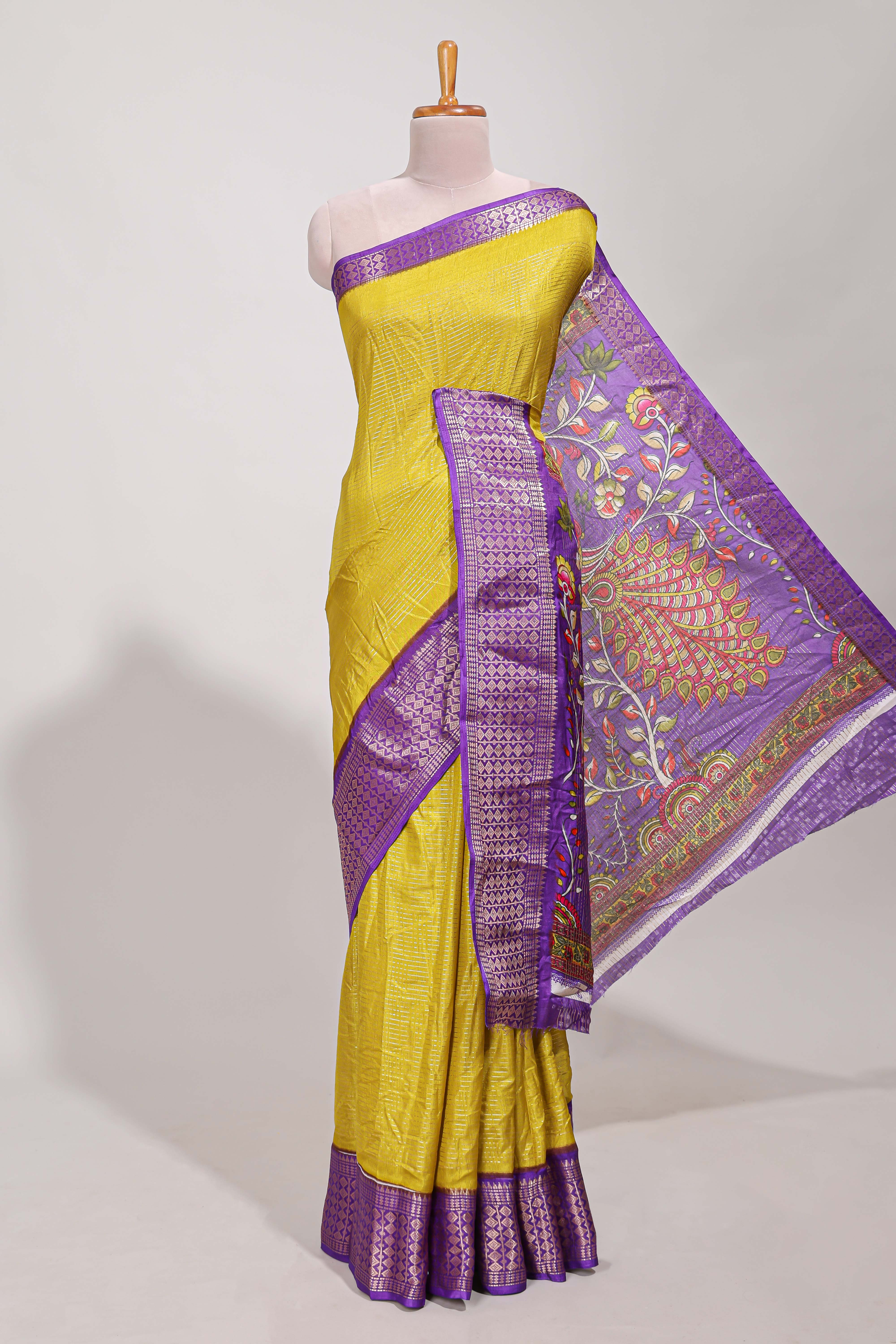 Dola silk saree all overzari workdesign with contrast zig zag border and contrast kalmkari printed pallu