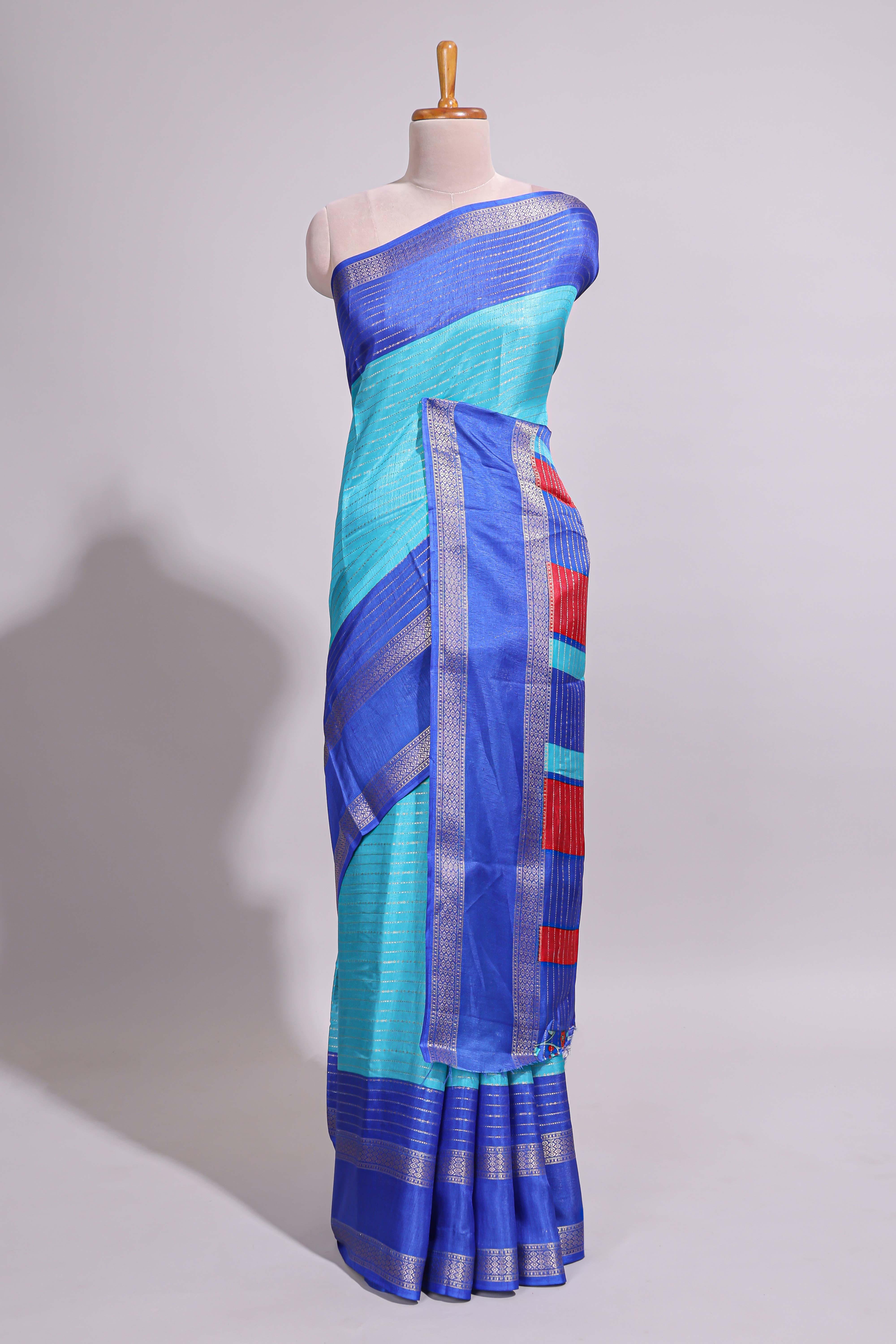 Turquoise green zari striped dola silk saree with contrast border and floral printed blouse