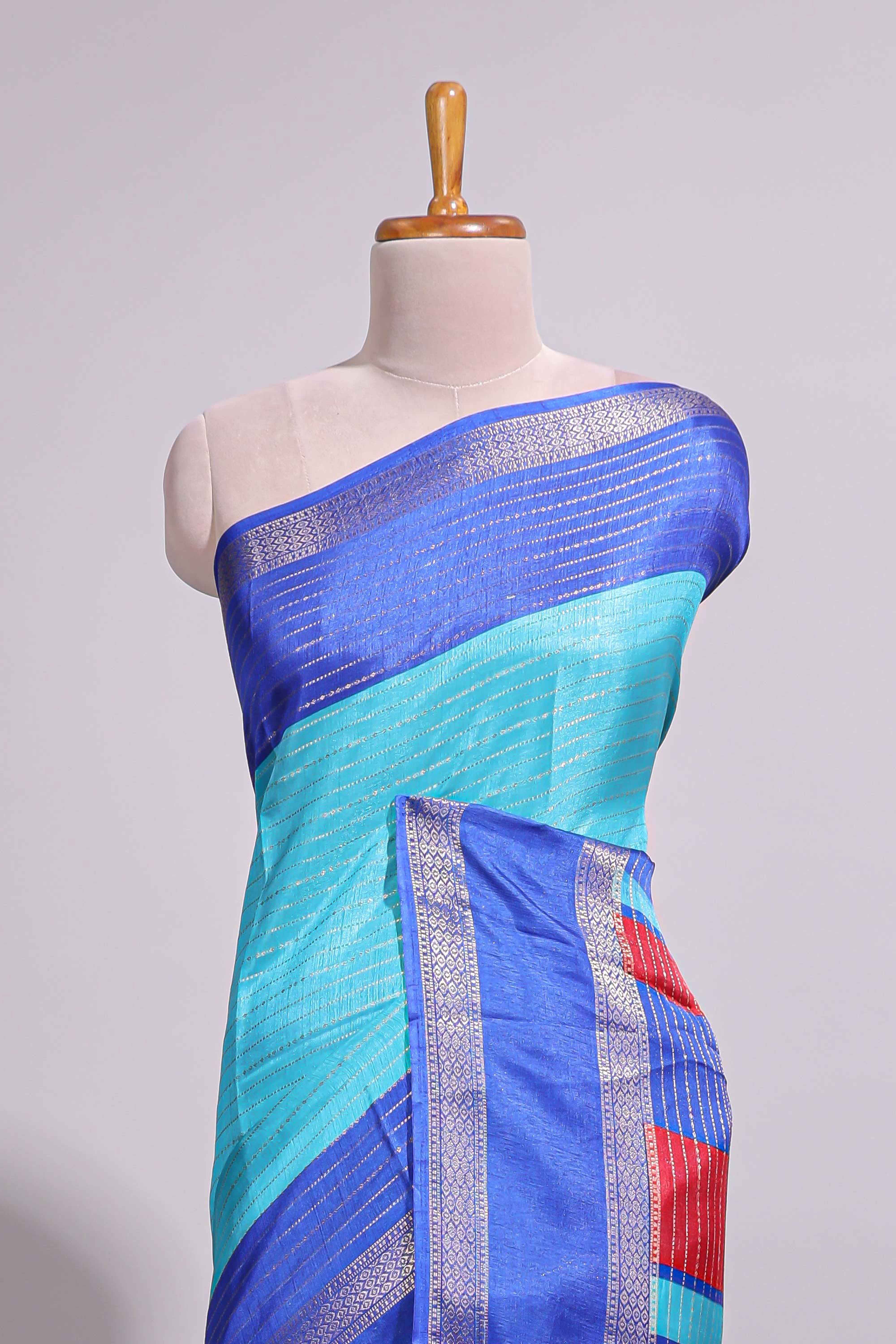 Turquoise green zari striped dola silk saree with contrast border and floral printed blouse