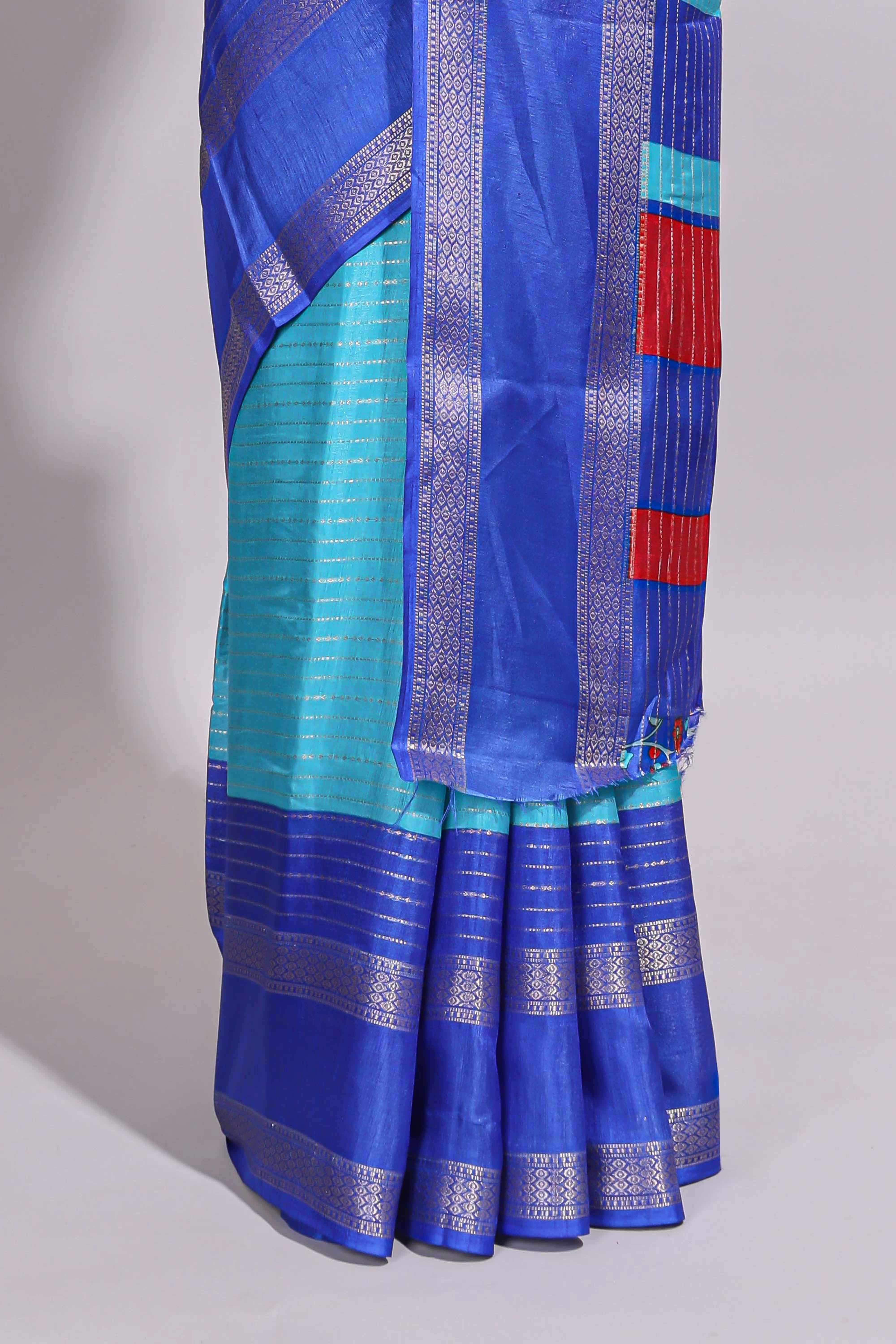 Turquoise green zari striped dola silk saree with contrast border and floral printed blouse