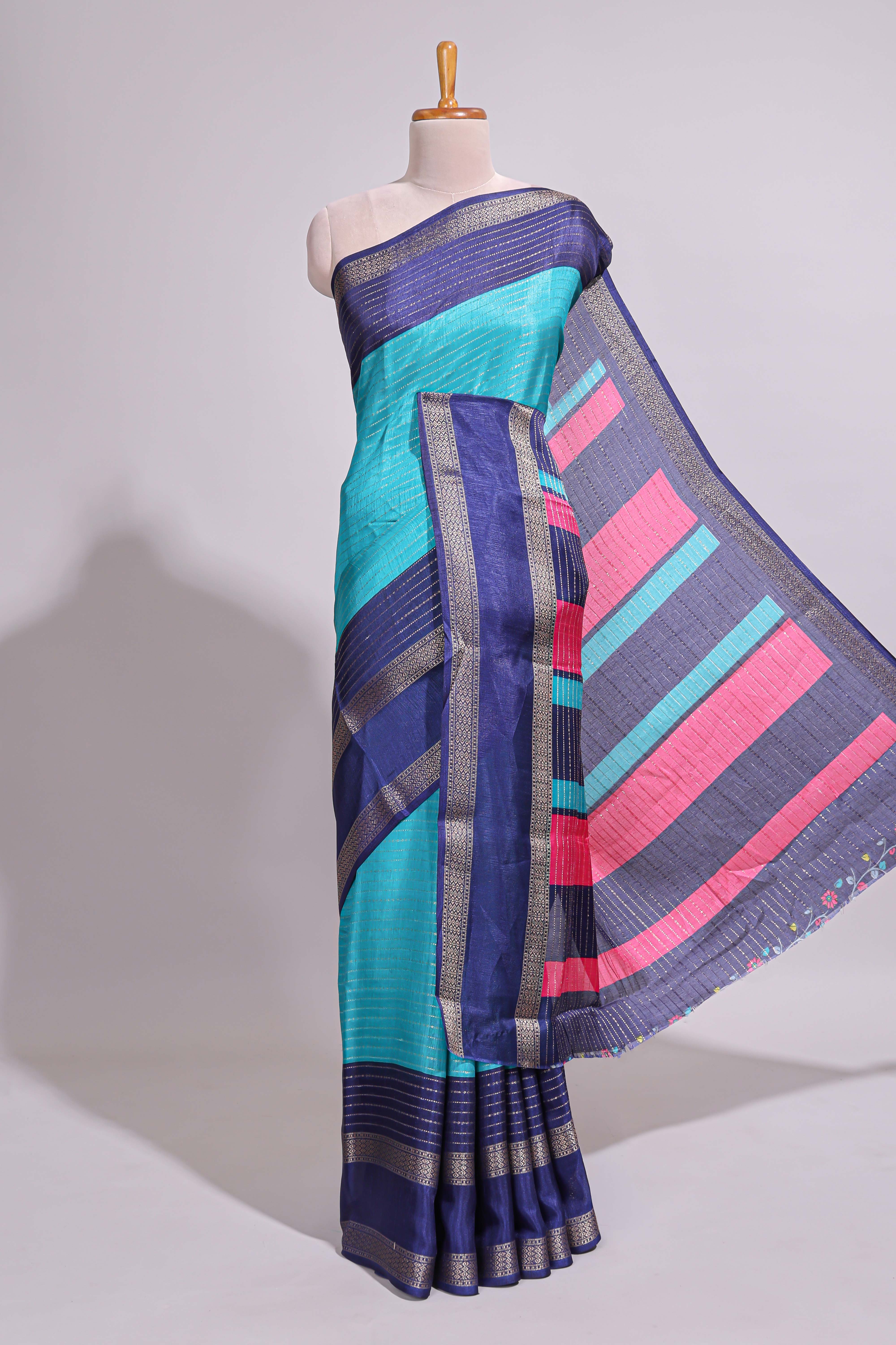 Turquoise green zari striped dola silk saree with contrast border and floral printed blouse