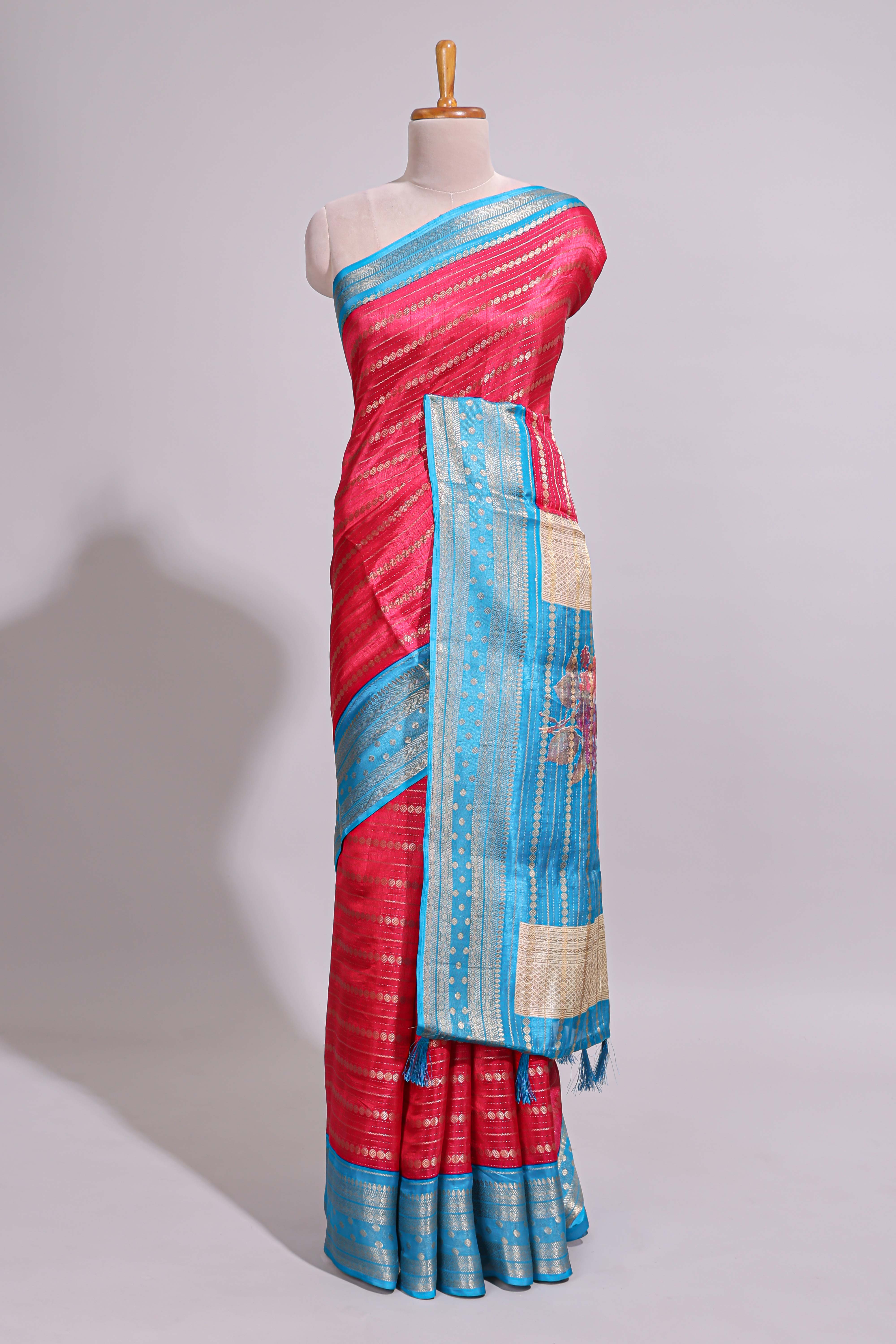 Pink zari striped dola silk saree with contrast border and floral printed pallu