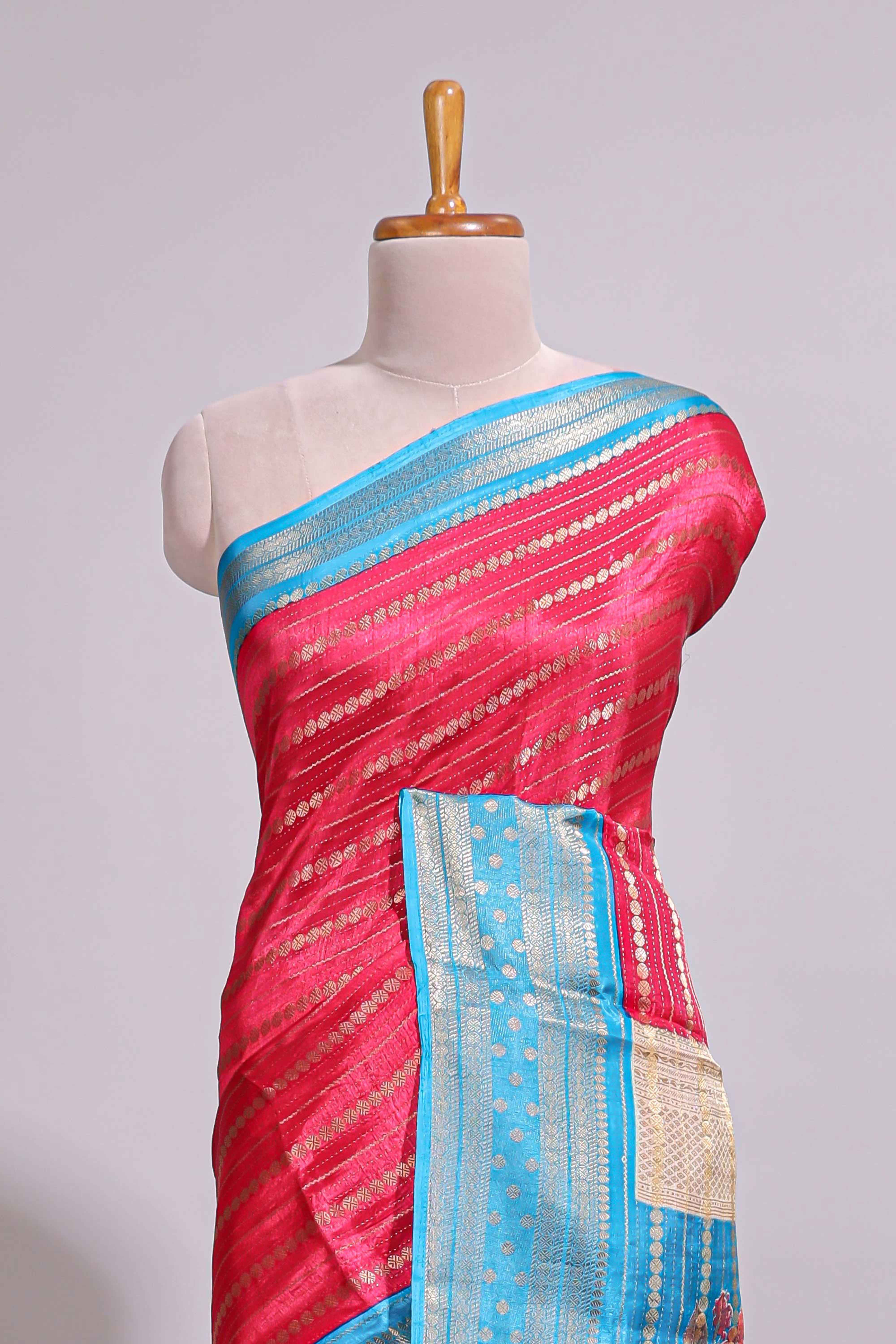 Pink zari striped dola silk saree with contrast border and floral printed pallu
