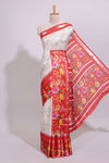 Off white floral design dola silk saree with contrast red border and printed motifs blouse