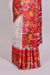 Off white floral design dola silk saree with contrast red border and printed motifs blouse